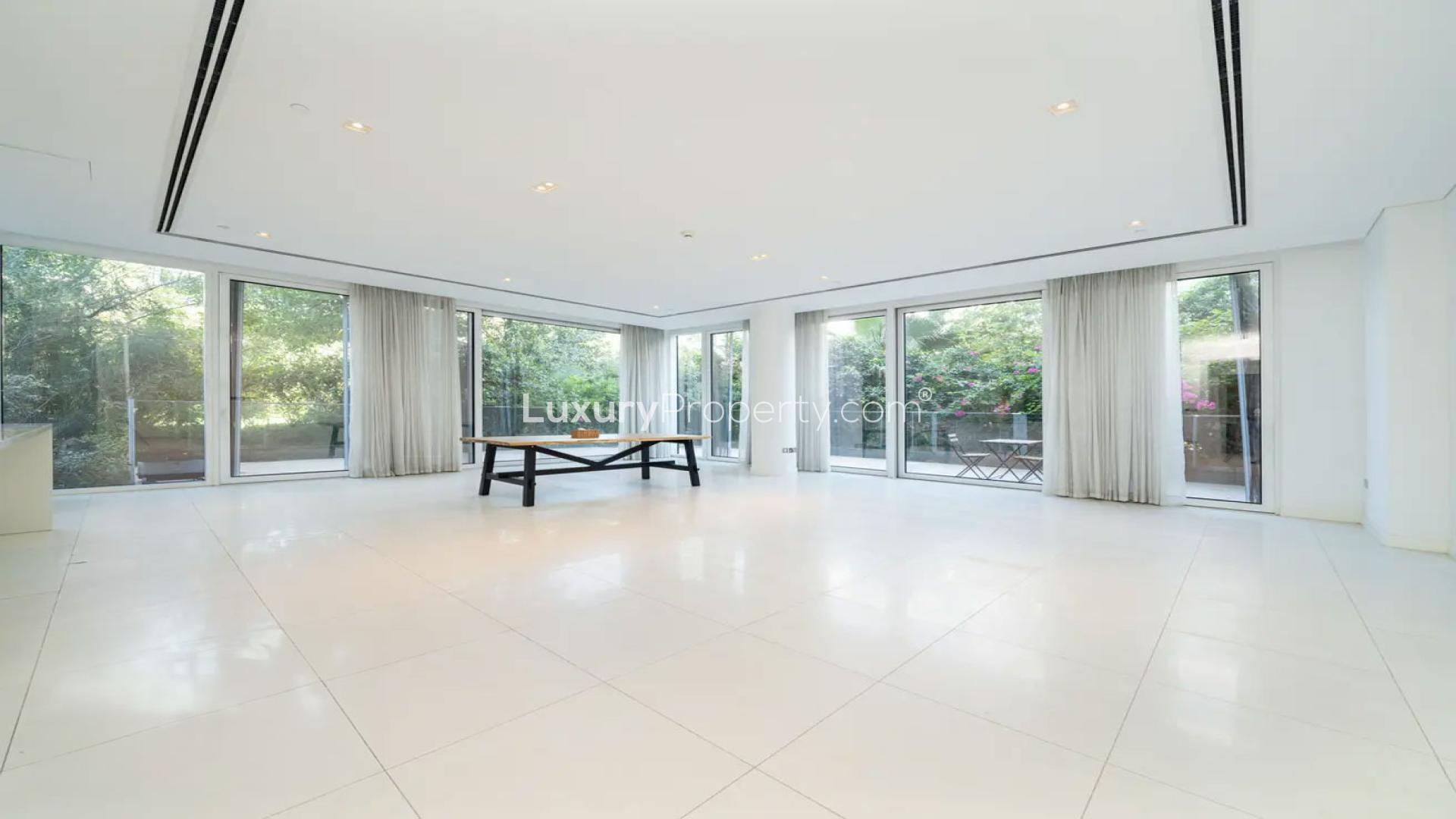 Spacious open-plan kitchen and living area in Al Barari Ashjar apartment for rent