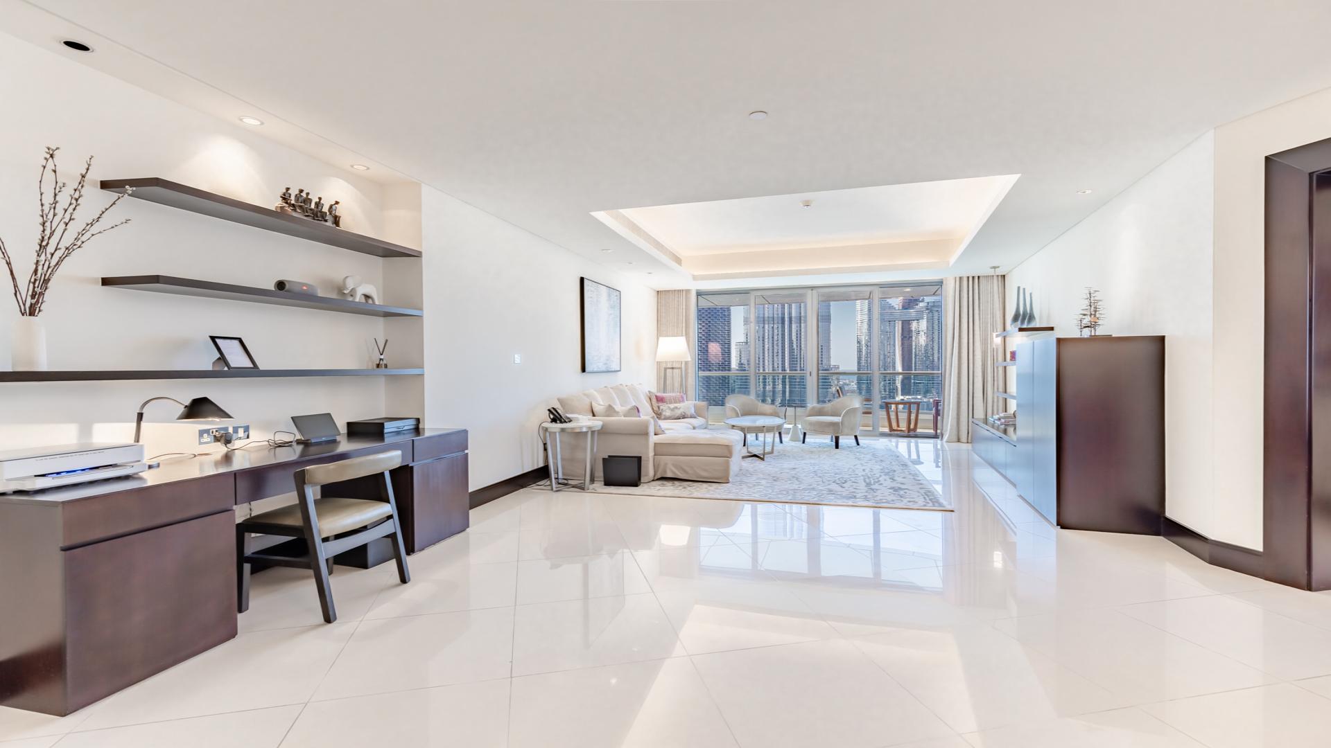 Luxurious living room in rare Downtown Dubai apartment with city view balcony