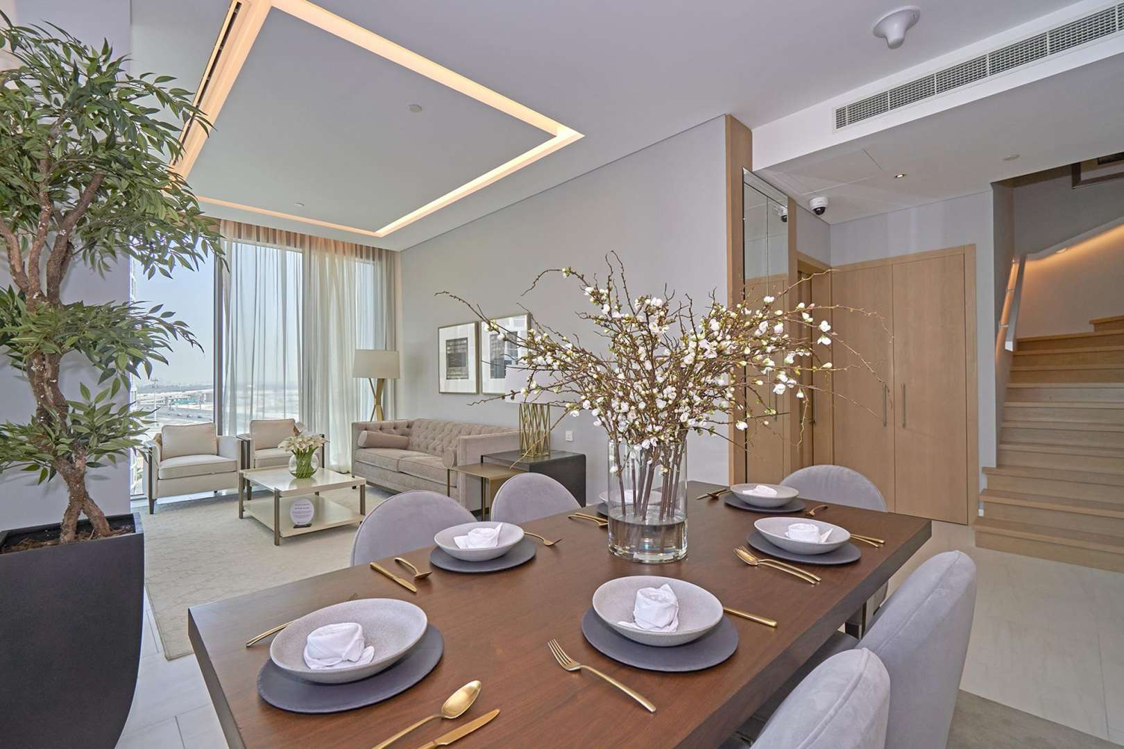 Elegant dining and living area in 2-bedroom duplex, SLS Dubai Residences, Business Bay