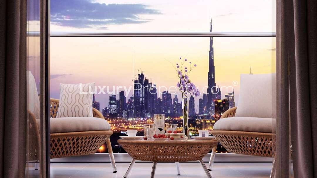 Modern apartment in Sobha Hartland with stunning downtown skyline and nature views at sunset