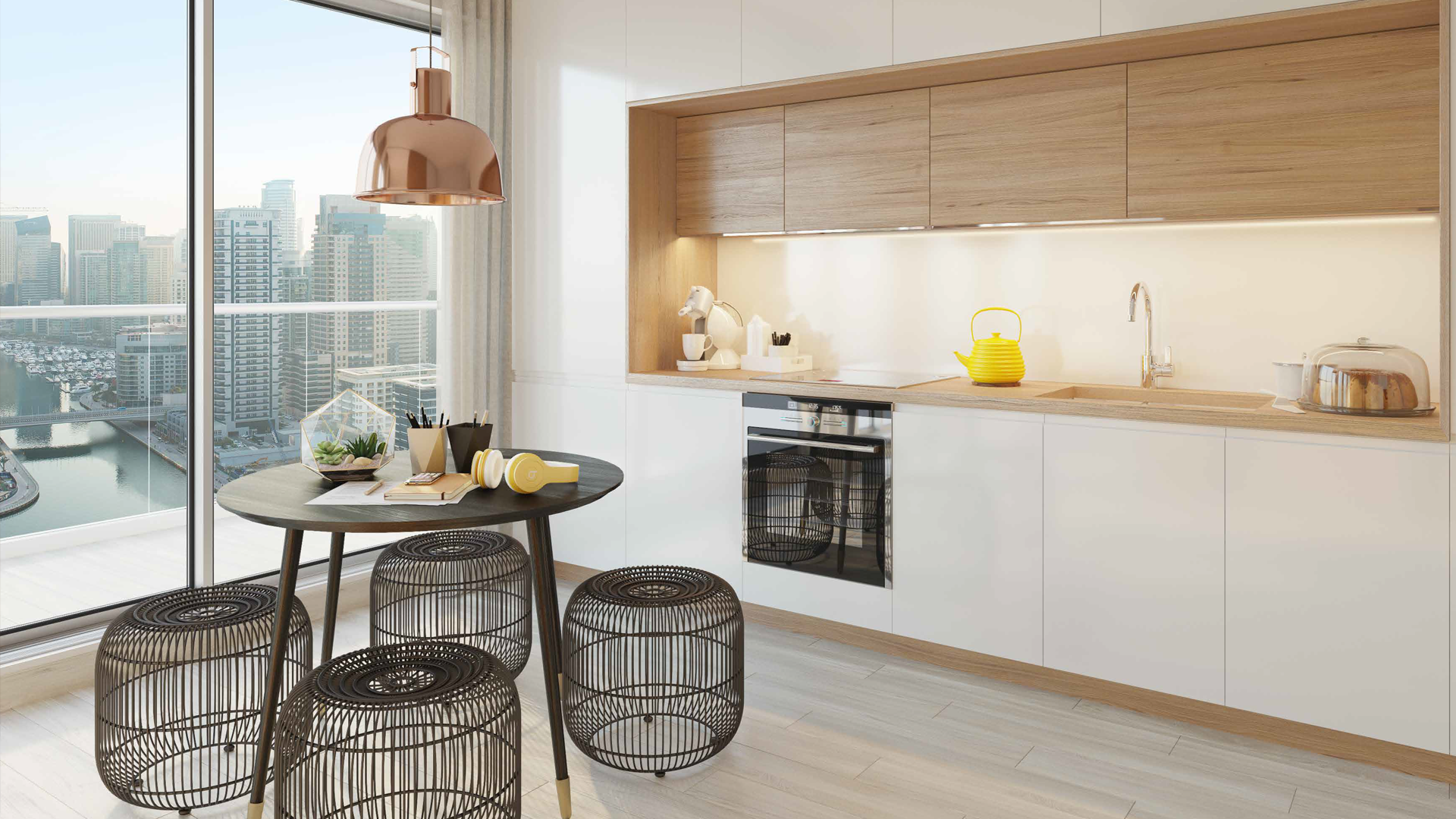 Modern lobby of Studio One in Dubai Marina with colorful art and seating area