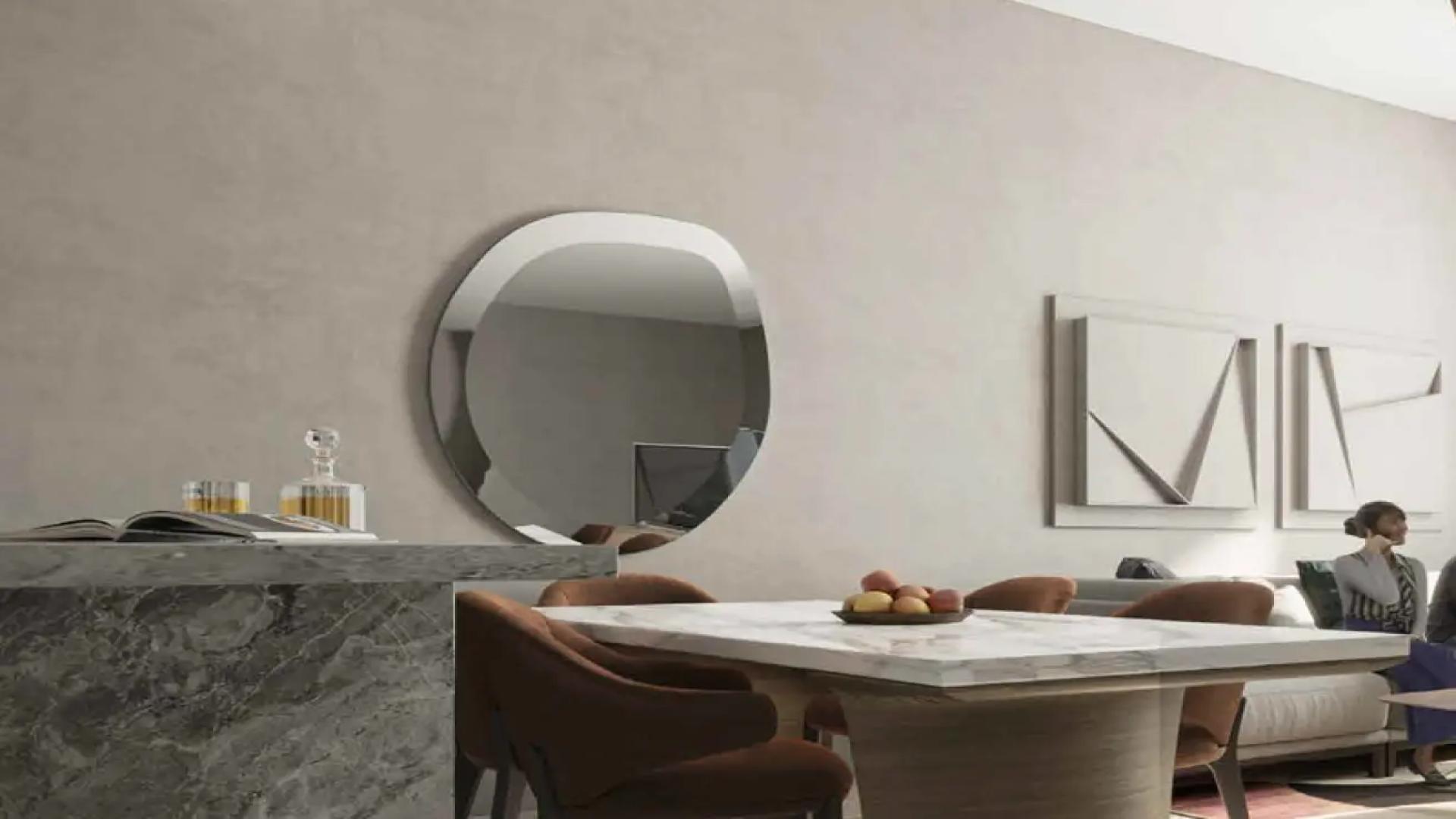 Lobby of Amalia Residences, Al Furjan, showcasing modern design and elegant reception area