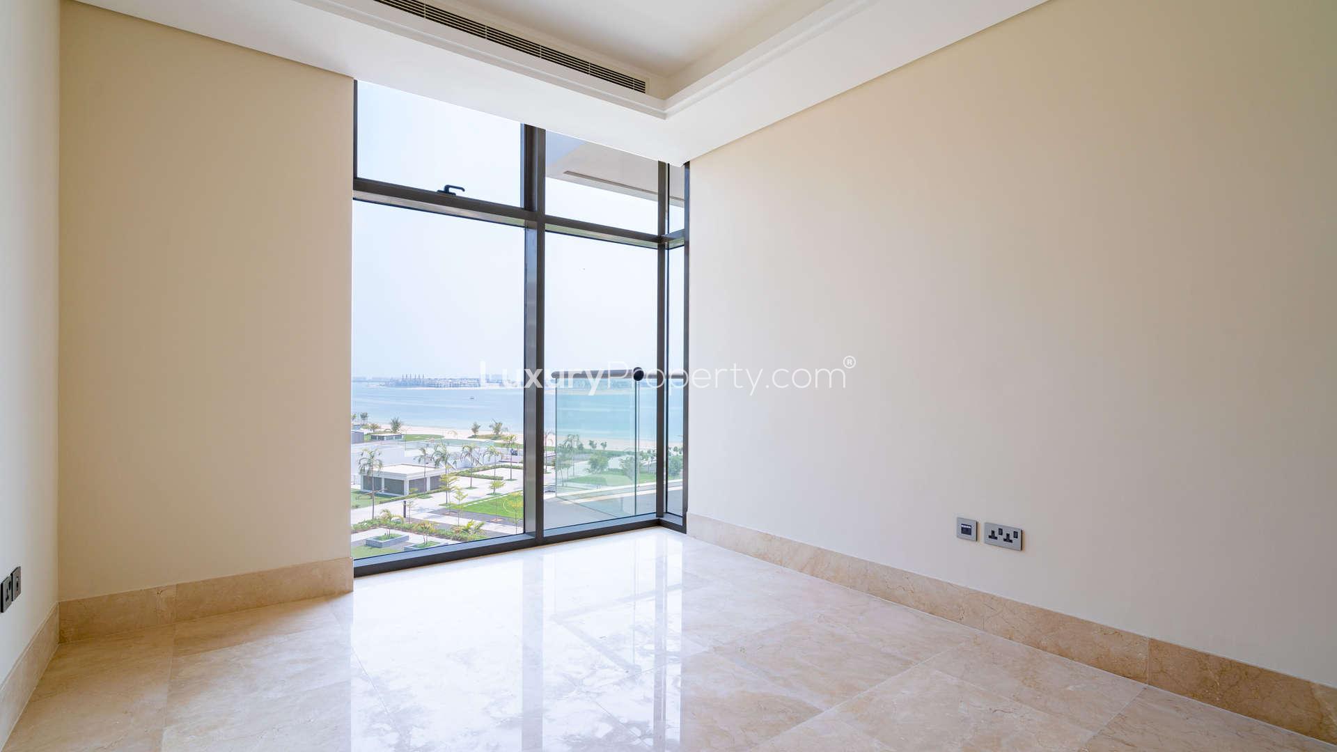 Stunning 2-bedroom apartment exterior at The 8, Palm Jumeirah, featuring landscaped gardens