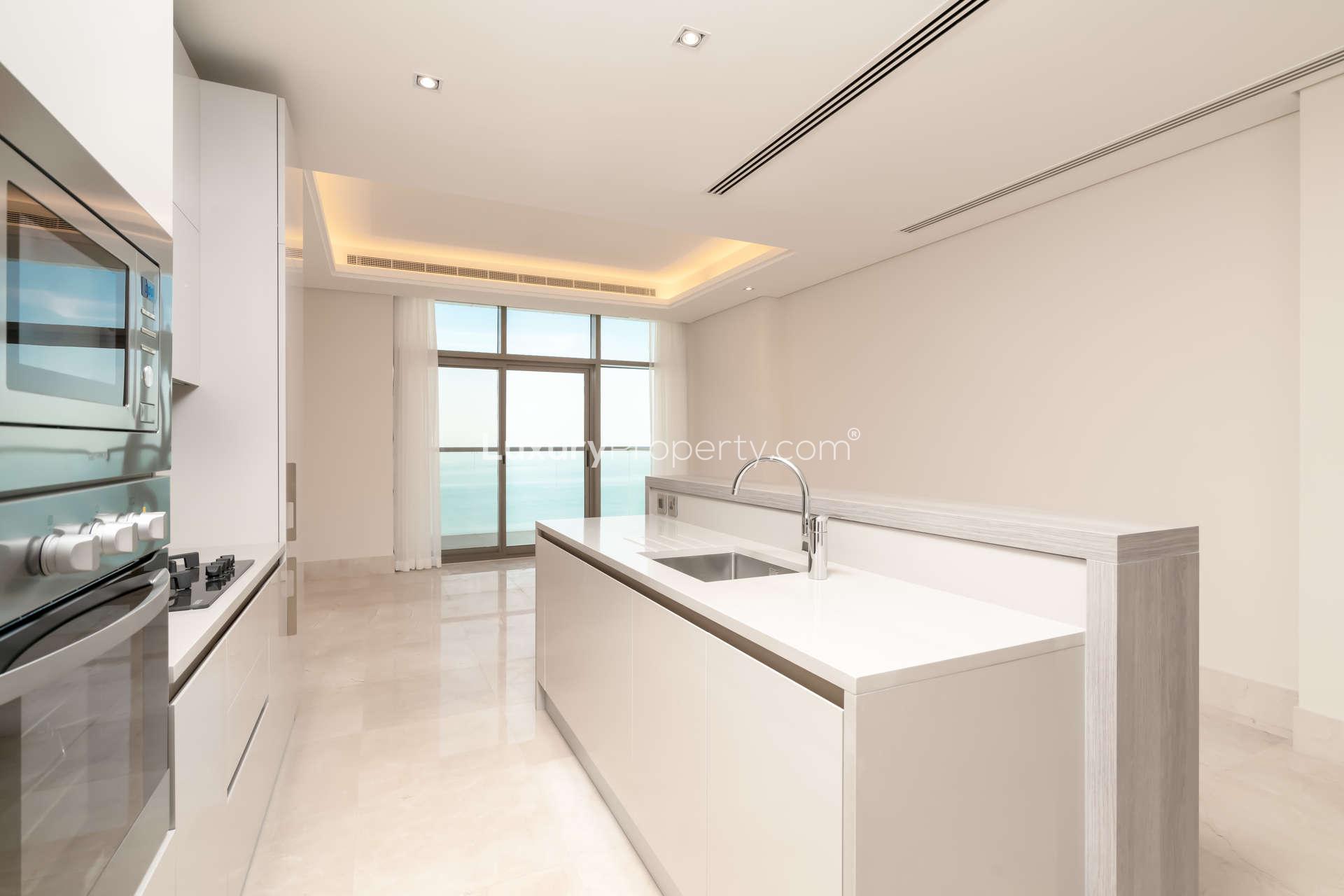 Modern kitchen with sea view in 2-bedroom apartment, The 8, Palm Jumeirah Dubai