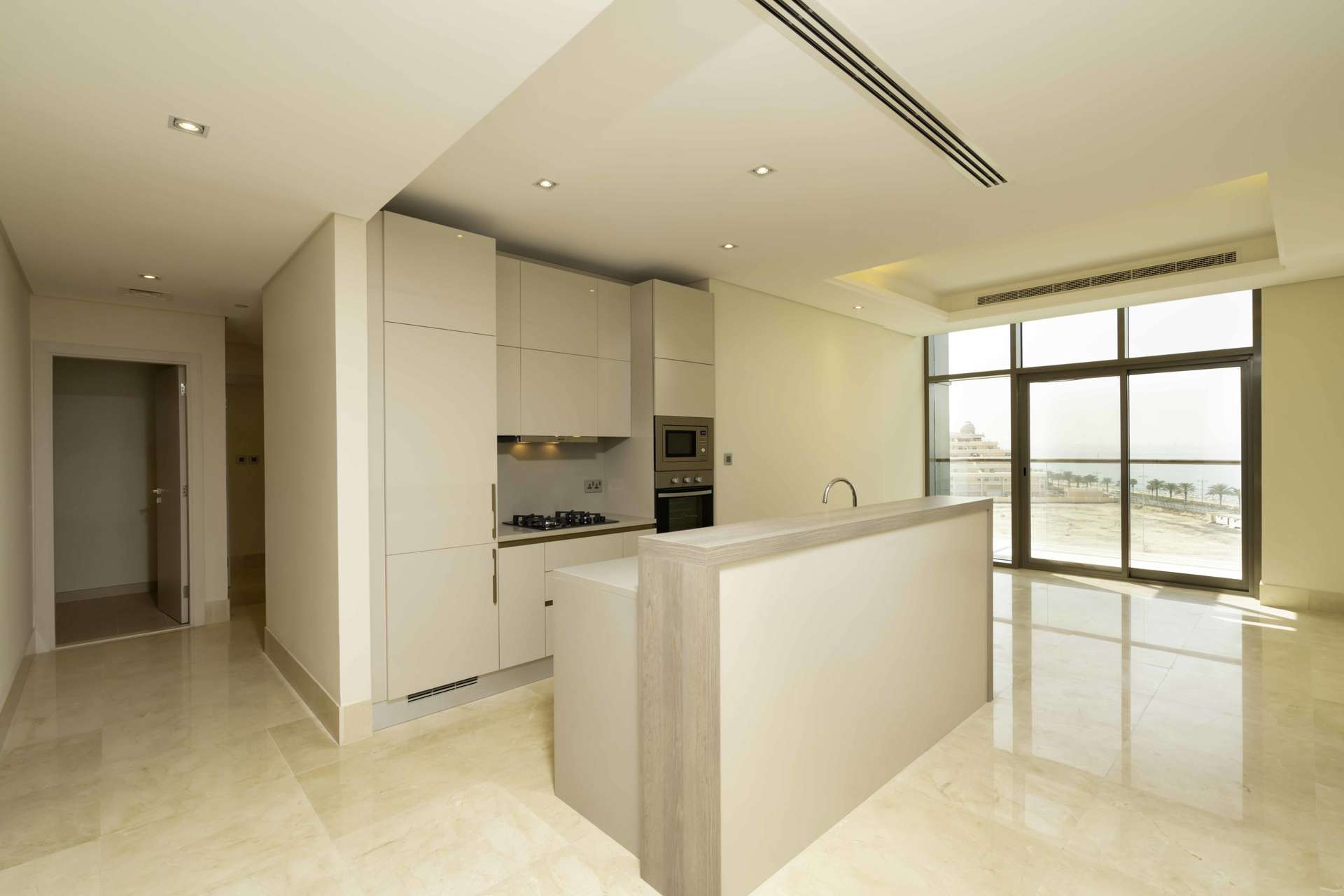 Waterfront view from 2-bedroom apartment balcony in The 8, Palm Jumeirah, Dubai skyline