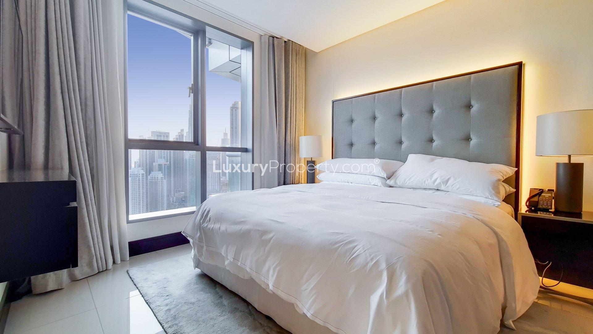 Luxury living room in Downtown Dubai apartment with Burj Khalifa view, modern decor