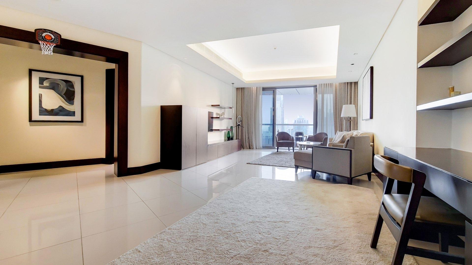 Downtown Dubai skyline view from luxury apartment, featuring Burj Khalifa and Burj Lake Hotel