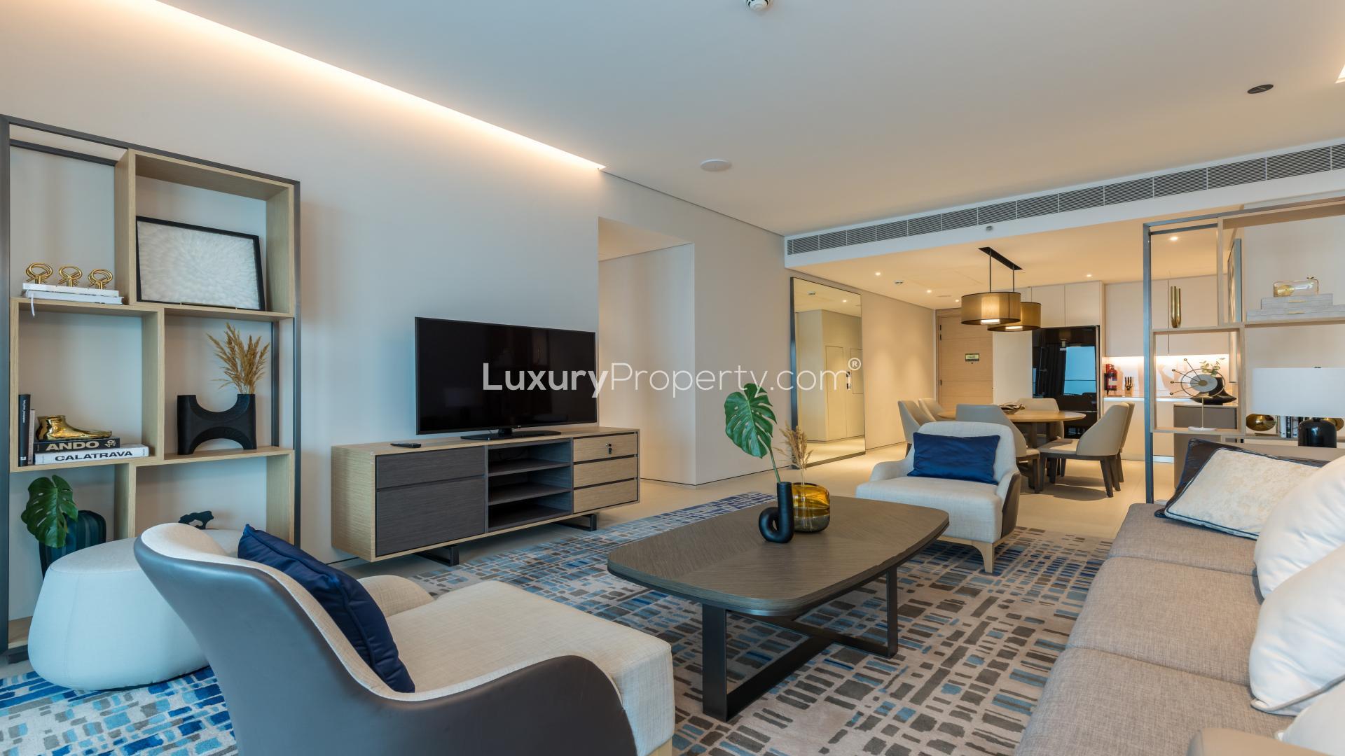 Modern living room in JBR apartment, featuring elegant decor and spacious layout for sale