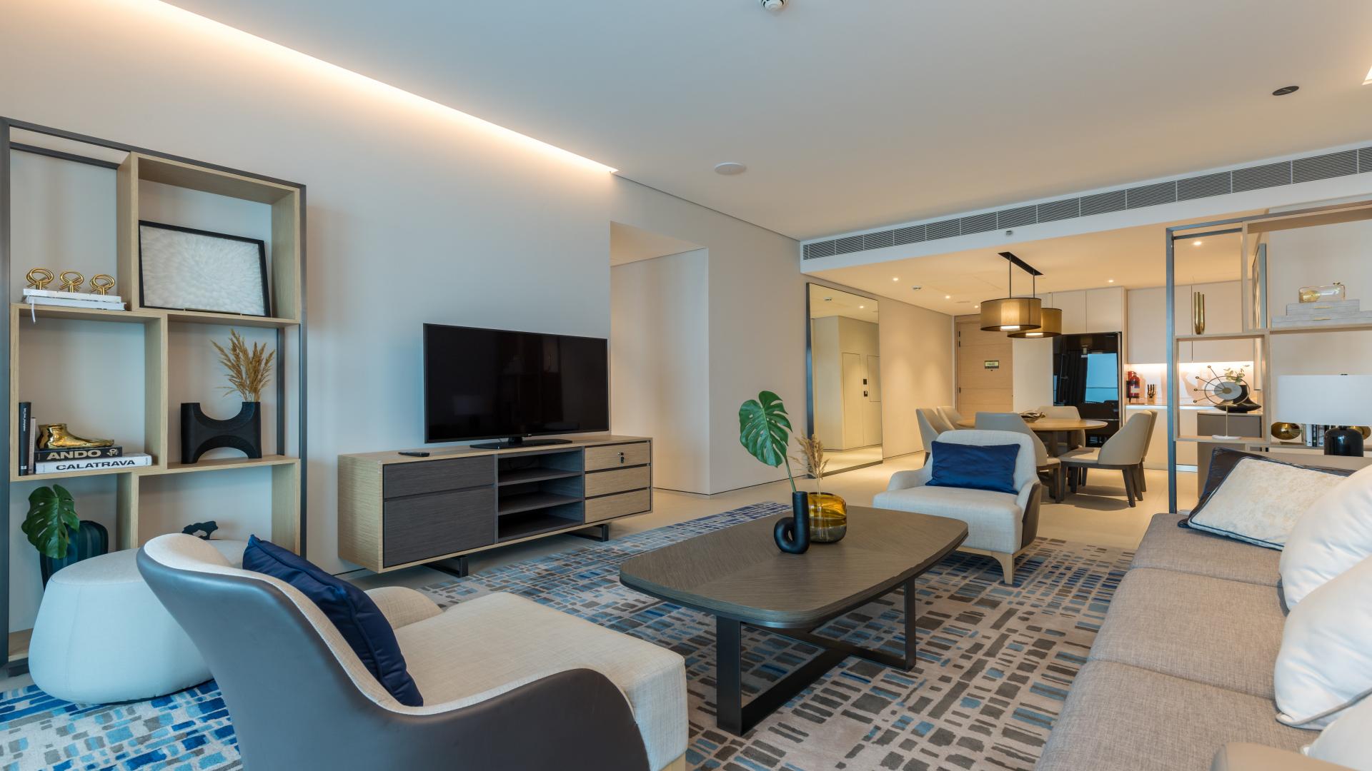 Modern living room in JBR apartment, featuring elegant decor and spacious layout for sale