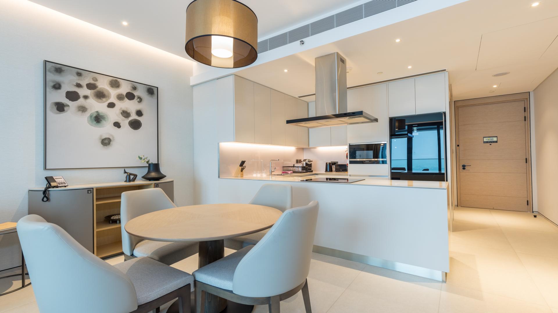 Modern living room in Jumeirah Beach Residence apartment with sea views, elegant decor