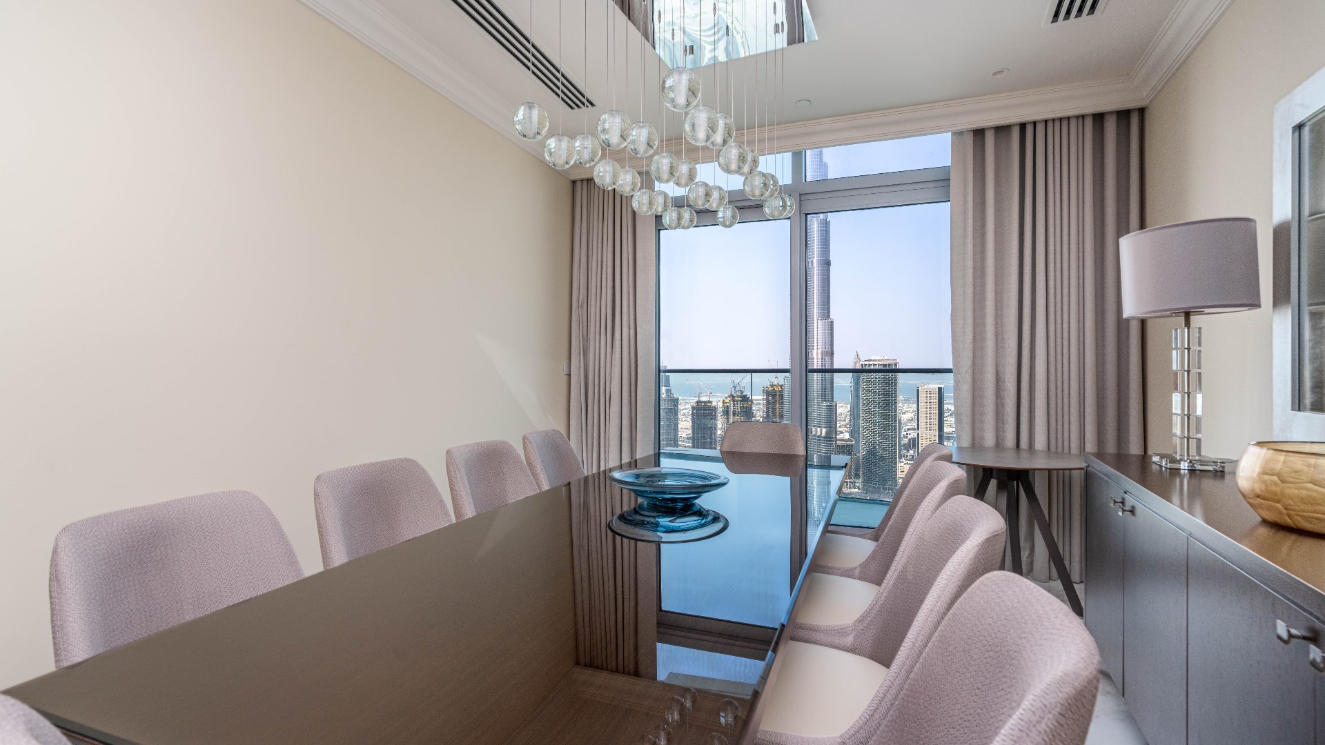 Luxurious living room in Downtown Dubai apartment, featuring elegant decor and modern furnishings