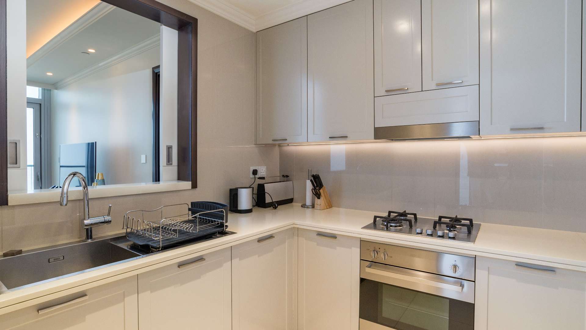 Modern kitchen in furnished 2-bedroom apartment, Address Fountain Views, Downtown Dubai