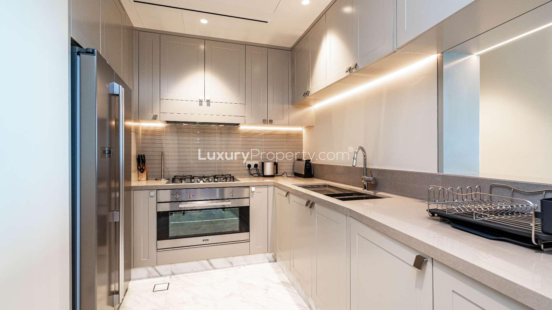 Furnished living room in 2-bedroom apartment, Address Fountain Views, Downtown Dubai, with cityscape view