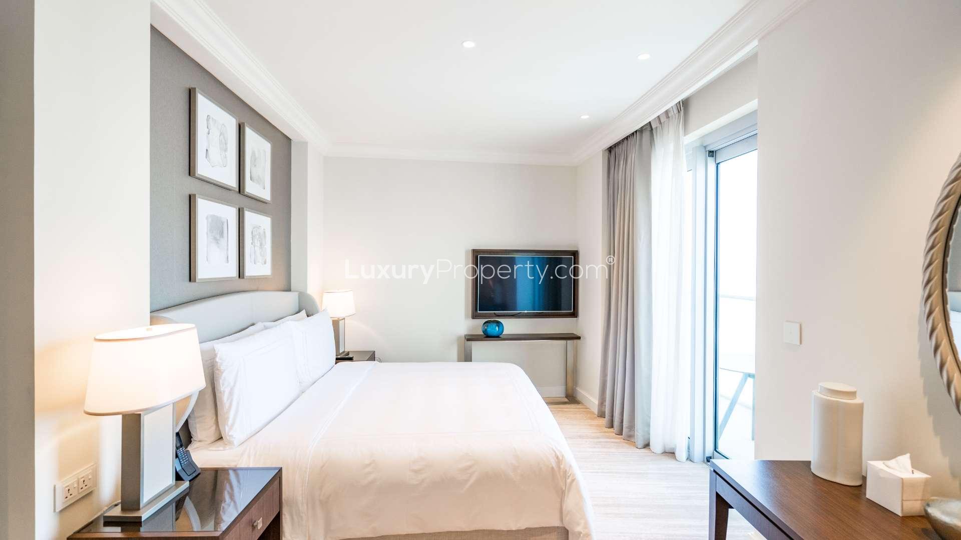 Contemporary 2-bedroom apartment interior with dining area in The Address Fountain Views, Dubai