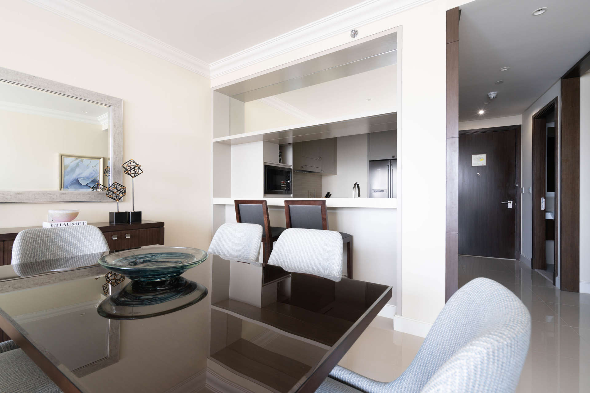 Fully furnished dining area and kitchen in Downtown Dubai apartment for sale