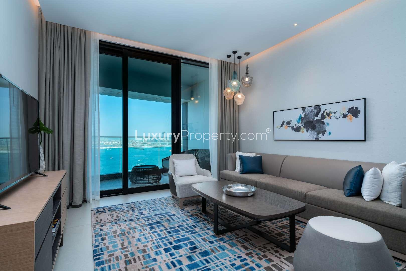 "Spacious bedroom in two-bed apartment at The Address Jumeirah Resort, Jumeirah Beach Residence.",Modern living room with sea view at The Address Jumeirah Resort apartment