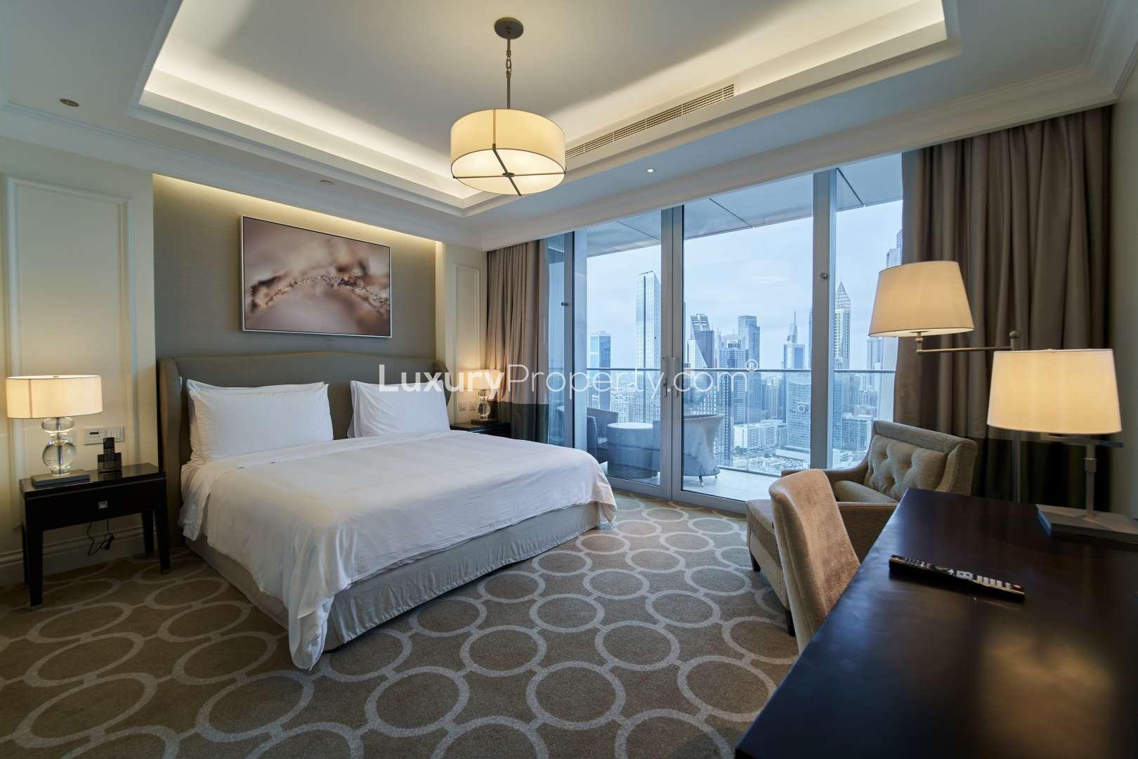"Elegant hallway in luxury Downtown Dubai apartment, The Address The BLVD, for sale.",Luxury high-floor apartment bedroom with DIFC view in The Address The BLVD, Downtown Dubai