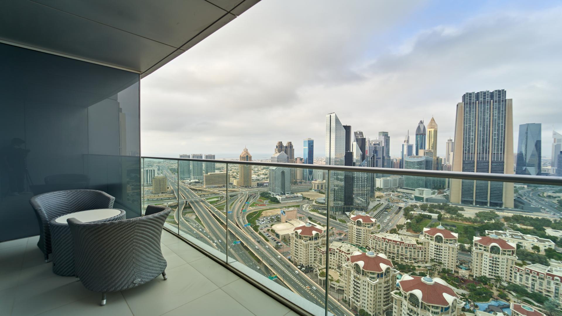 Modern dining area with city views in luxury Downtown Dubai apartment, The Address The BLVD