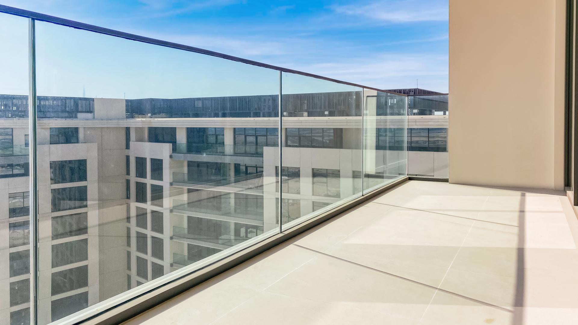 Modern living room with large windows and sea view in The Cove, Dubai Creek Harbour