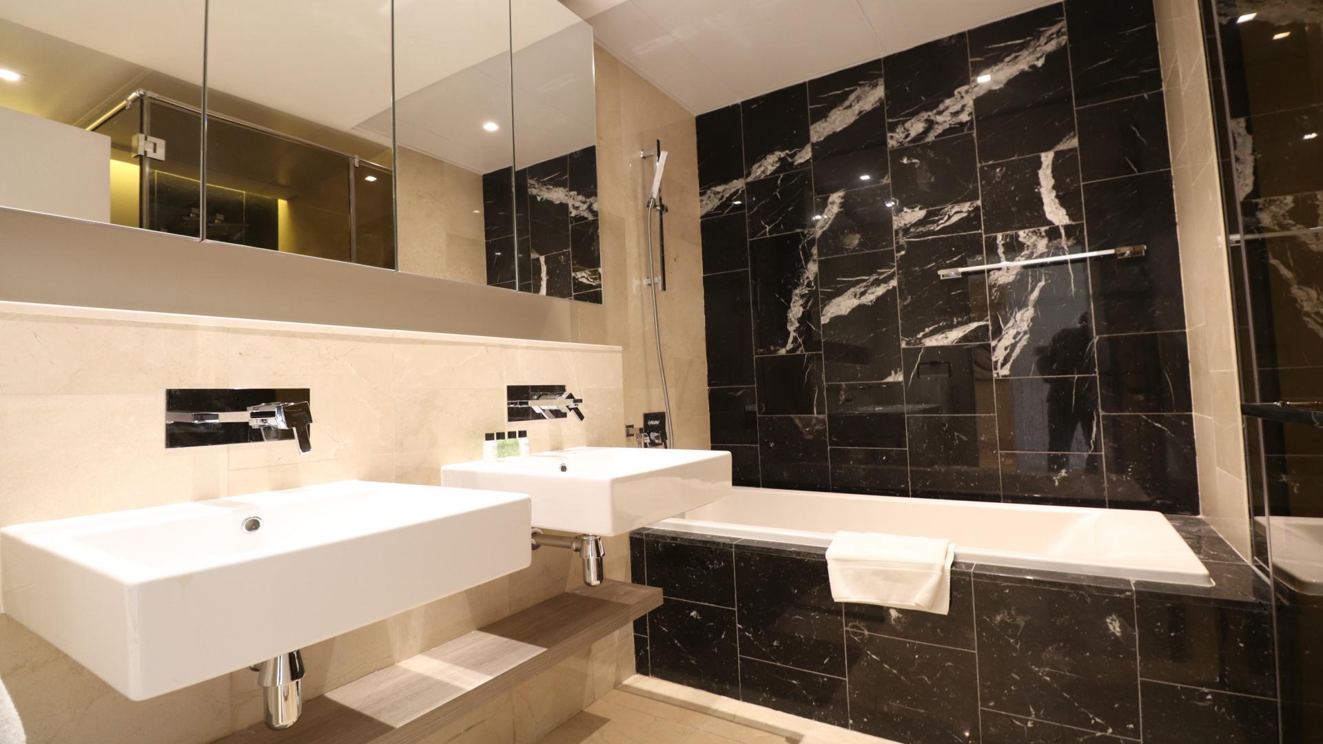 High-floor apartment bedroom with large window and skyline view, Palm Jumeirah, The Crescent