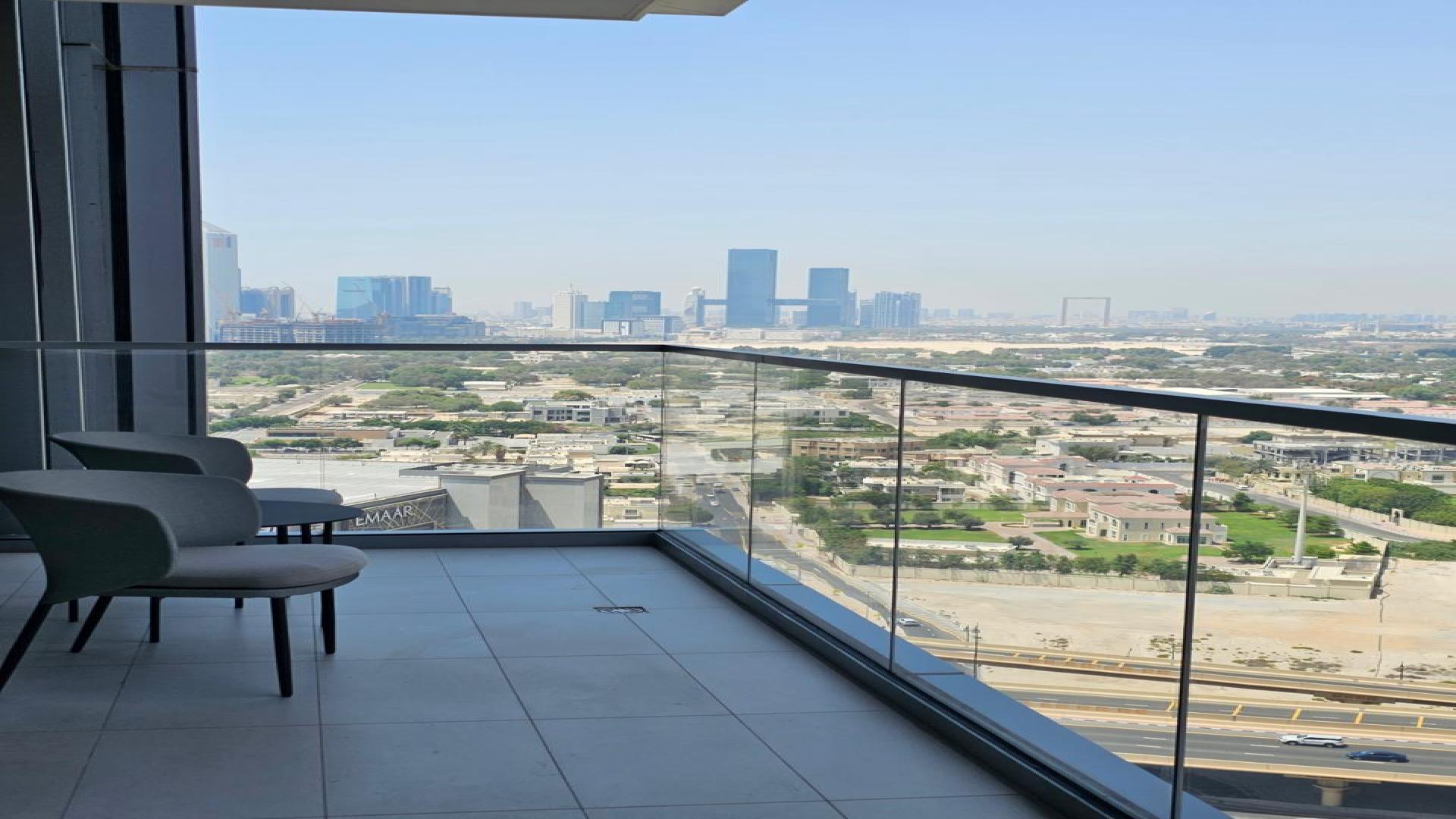 Modern living room in Vida Residences Dubai Mall apartment, Downtown Dubai, with stylish decor