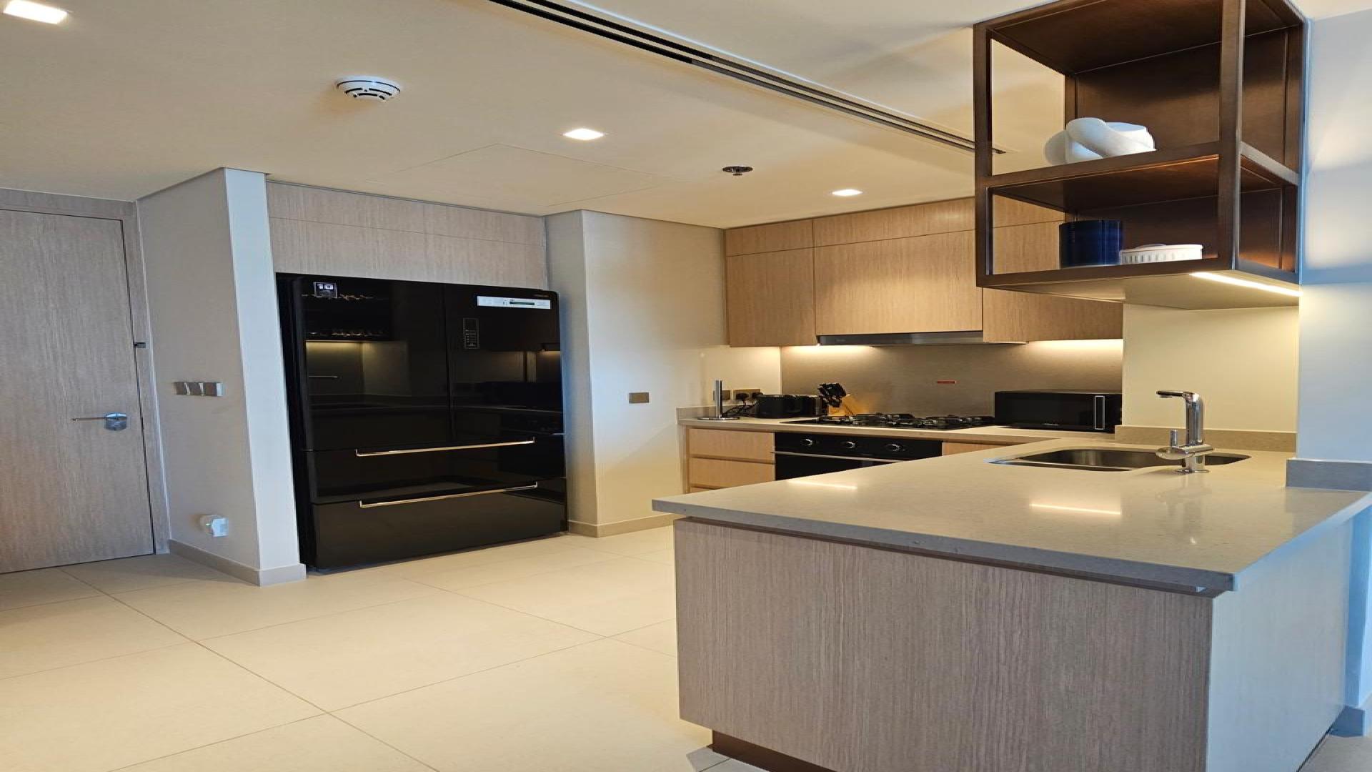 Modern bedroom in Vida Residences, Downtown Dubai apartment for sale, featuring elegant decor