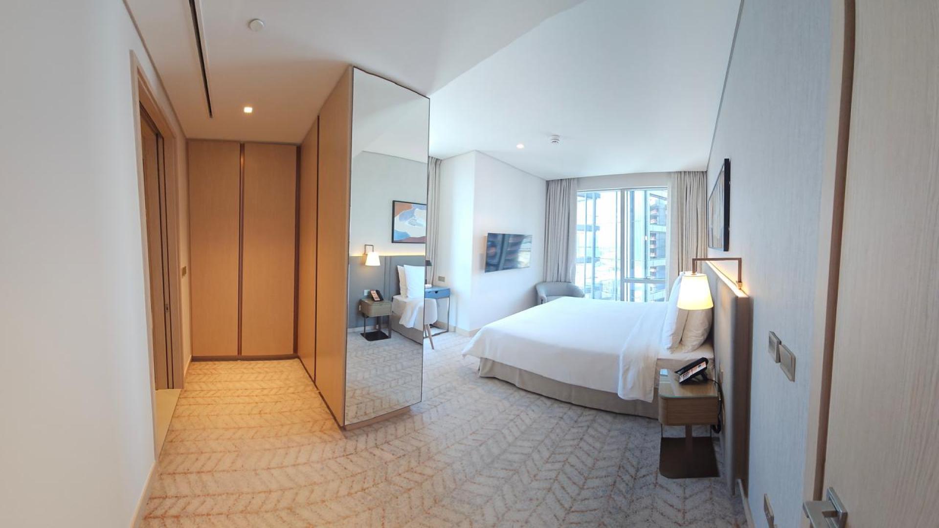 Balcony view from Vida Residences Dubai Mall apartment overlooking Downtown Dubai skyline