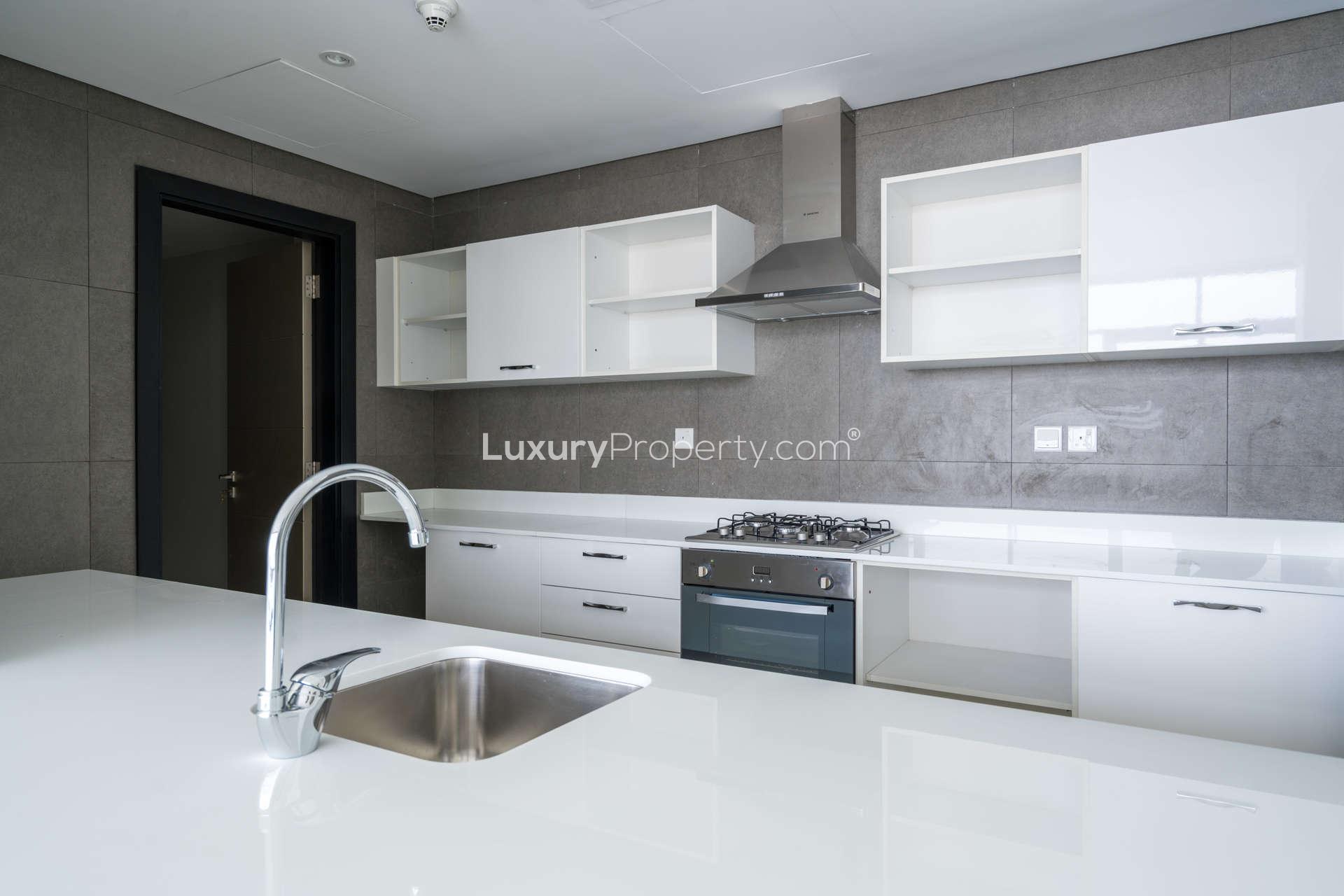 Hallway of two-bedroom apartment in Meydan Avenue, featuring modern design and bathroom access