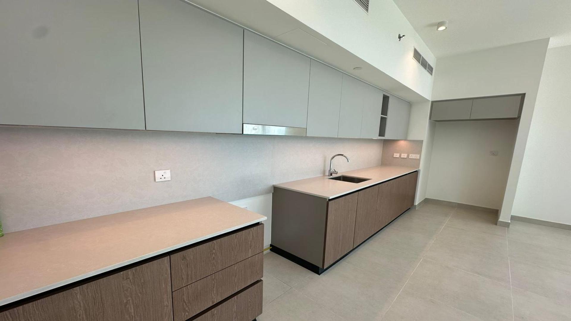 Modern kitchen in 2-bedroom apartment for sale, Dubai Creek Harbour, Creek Palace