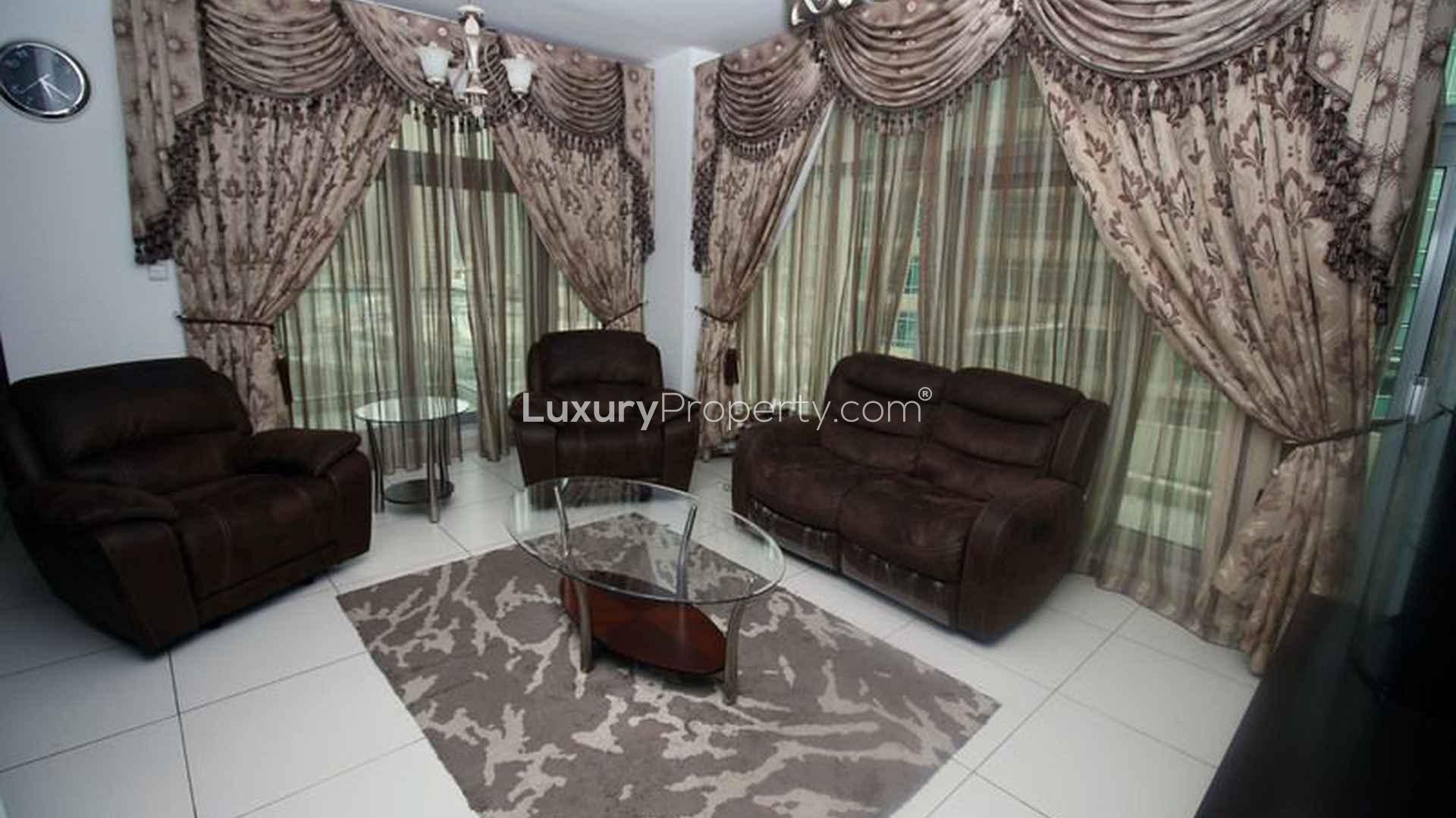 Living room with plush seating in The Lofts, Downtown Dubai apartment for sale