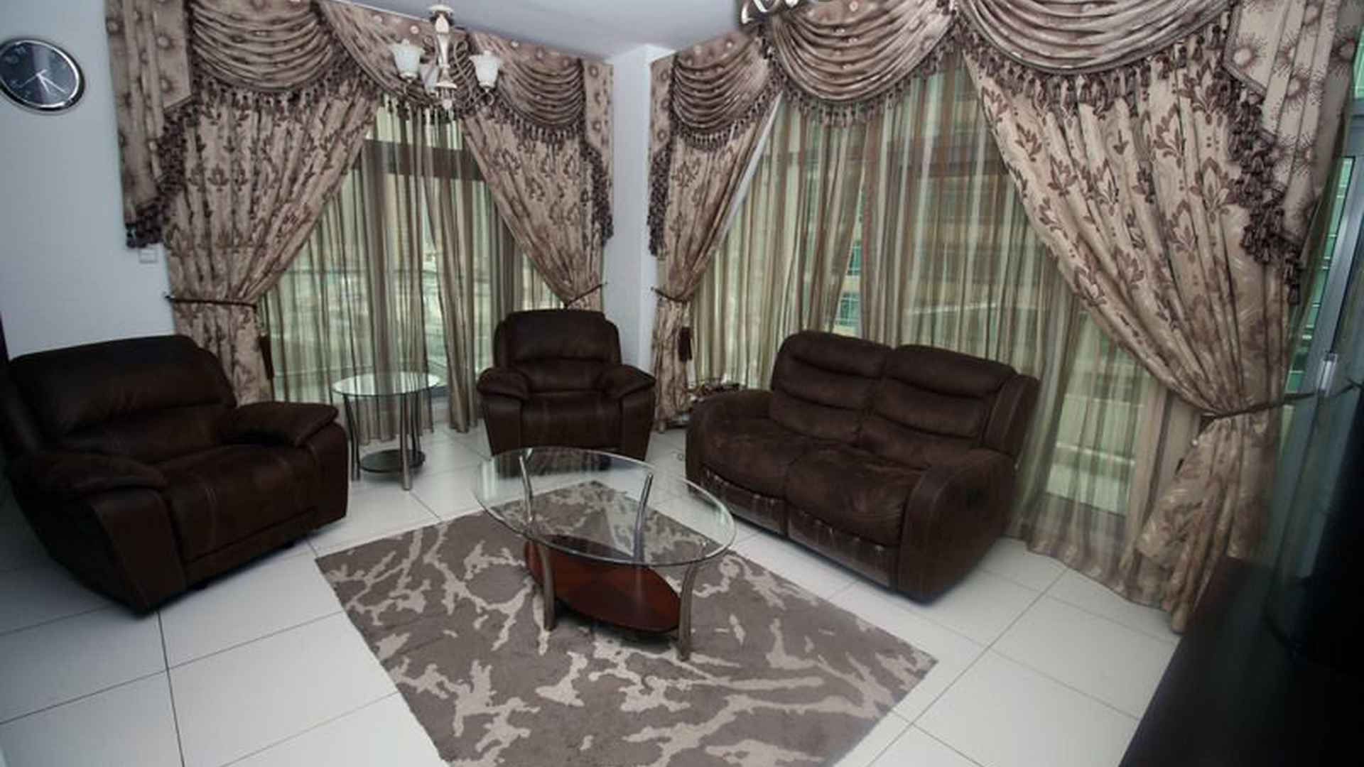 Living room with plush seating in The Lofts, Downtown Dubai apartment for sale