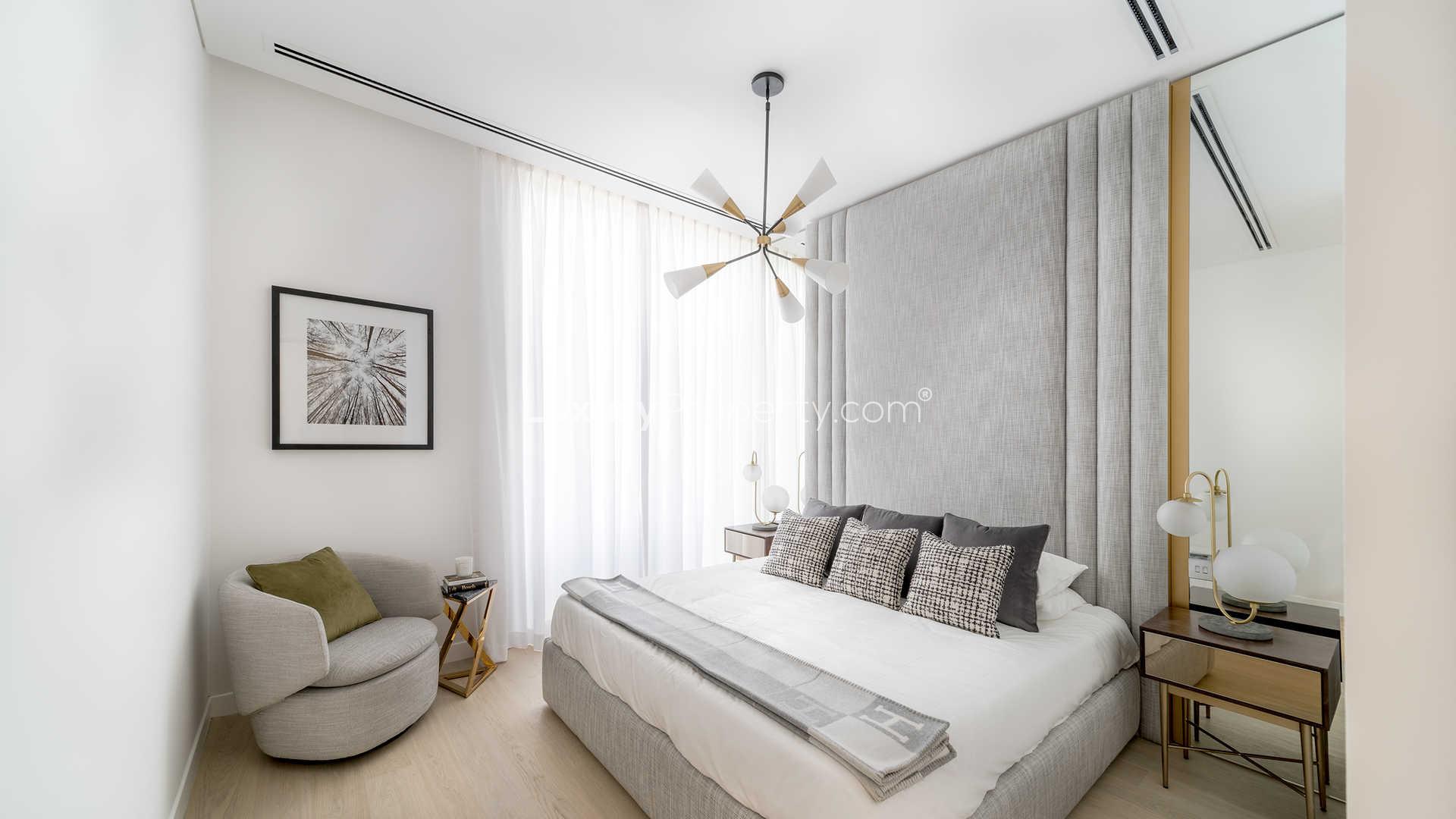 Exterior view of lush gardens and modern architecture in Al Barari's The Neighbourhood