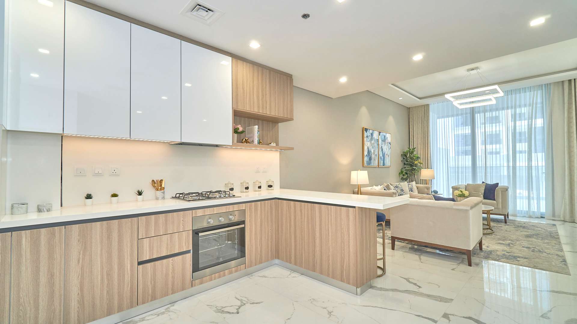 Modern kitchen and living area in Dubai Hills Estate apartment, Pinnacle sub-community