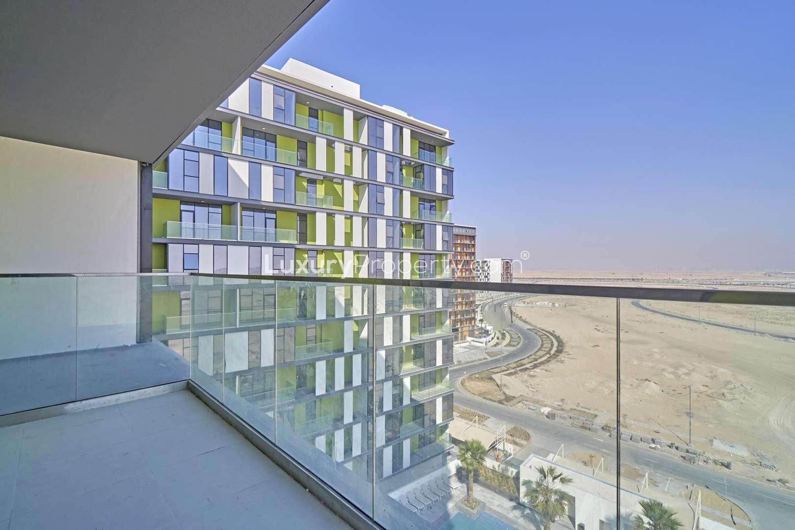 Empty living room in modern apartment, The Pulse Boulevard, Dubai South