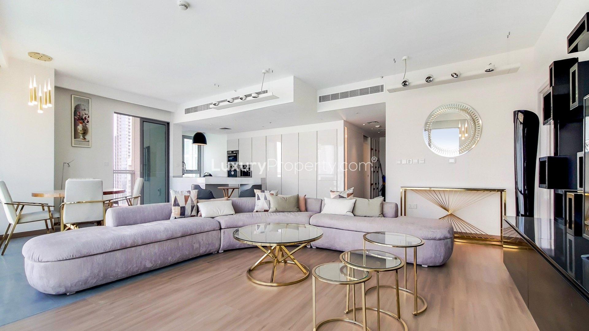 Modern living room in upgraded Downtown Dubai apartment, featuring elegant decor and spacious layout