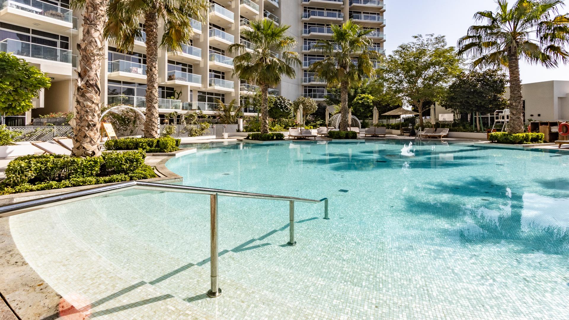 Living room of upgraded two-bed duplex in Hameni Tower, Jumeirah Village Circle