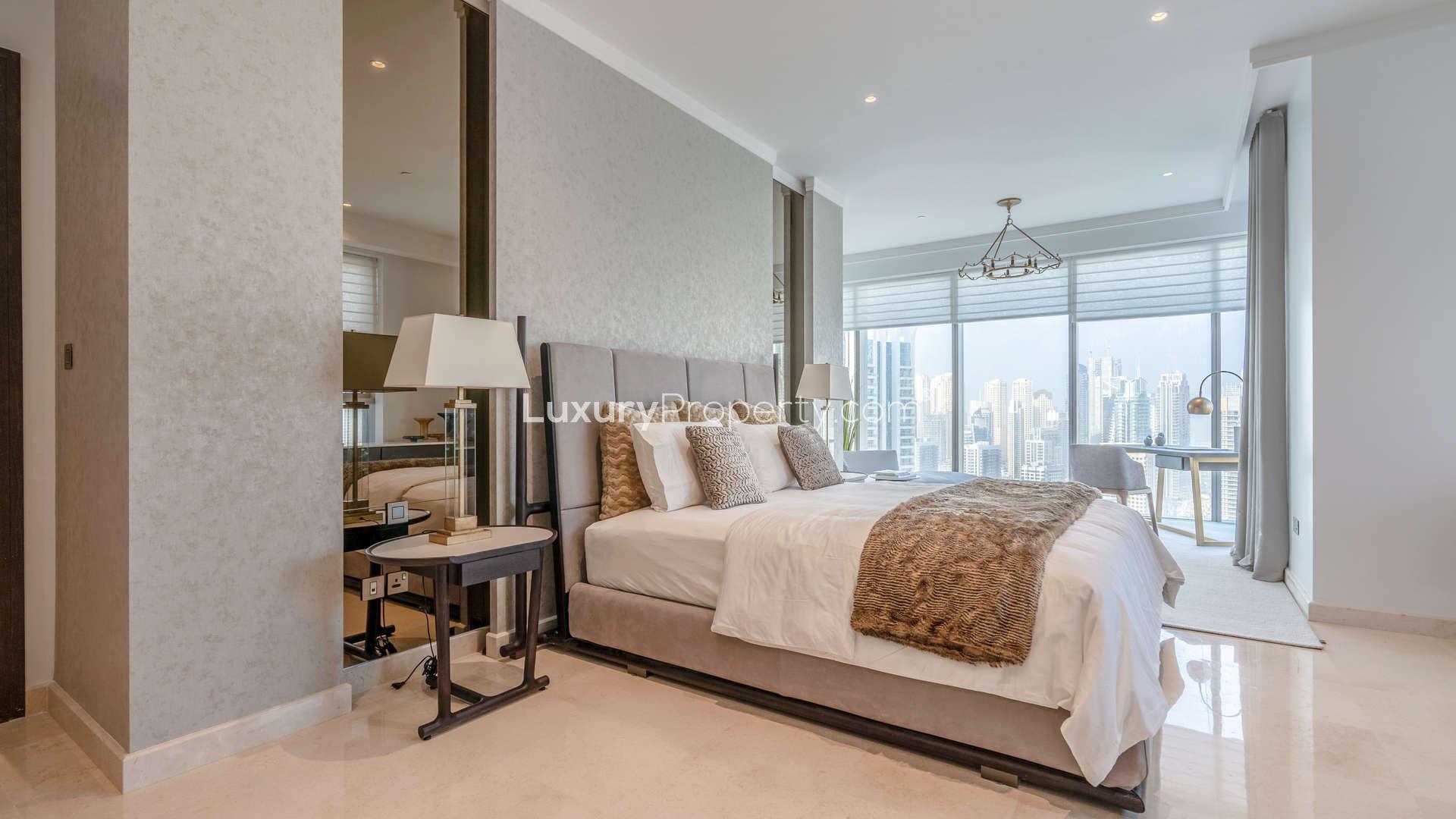 Modern bedroom in 2-bedroom apartment, The Residences JLT, Dubai with city view balcony