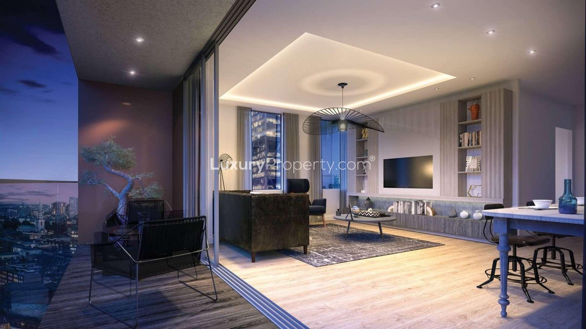 Modern living room in luxury 2-bedroom apartment, The Stage, Shoreditch, London with city views
