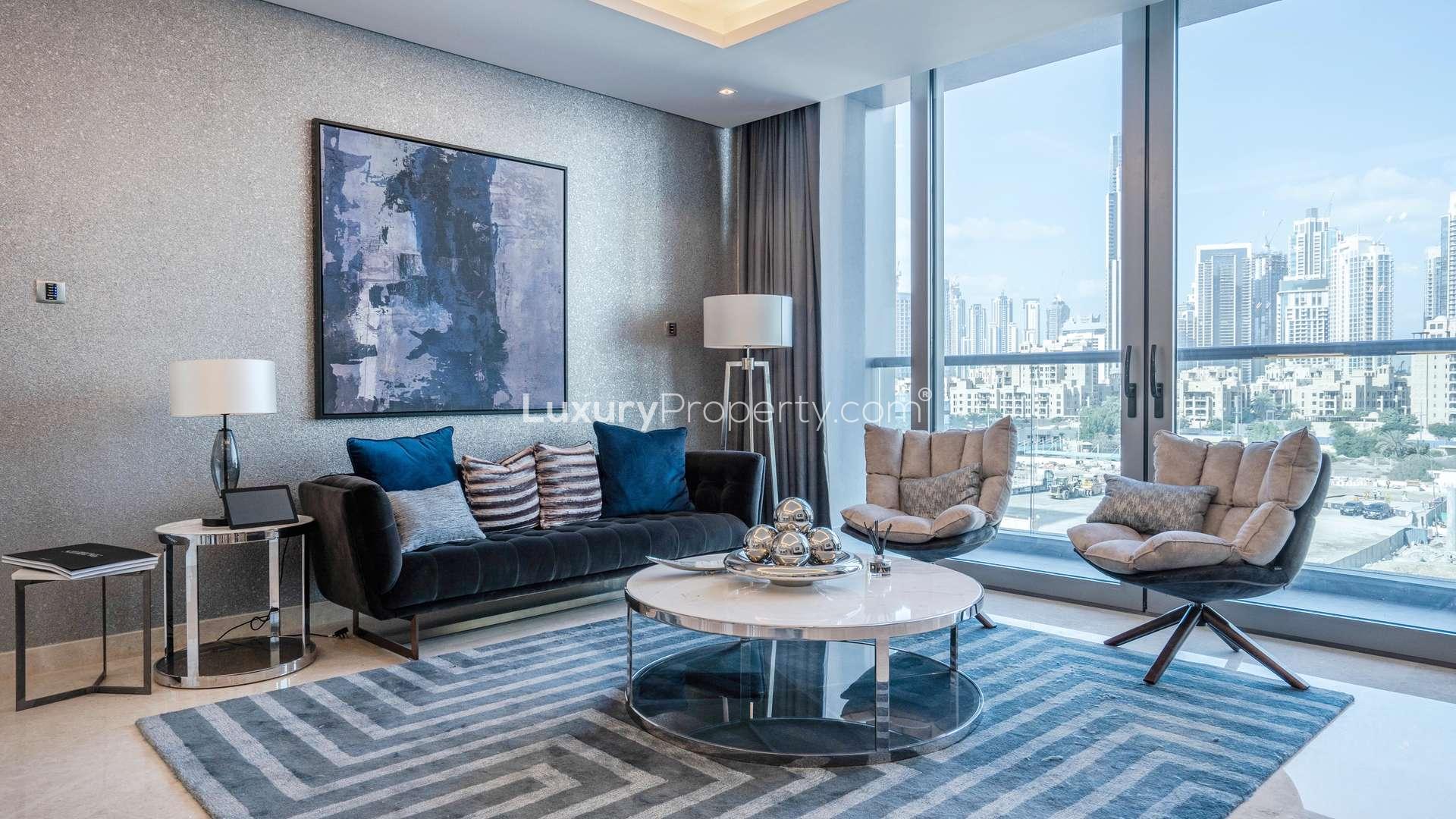 Modern living and dining area in upgraded two-bedroom apartment, The Sterling, Business Bay, Dubai