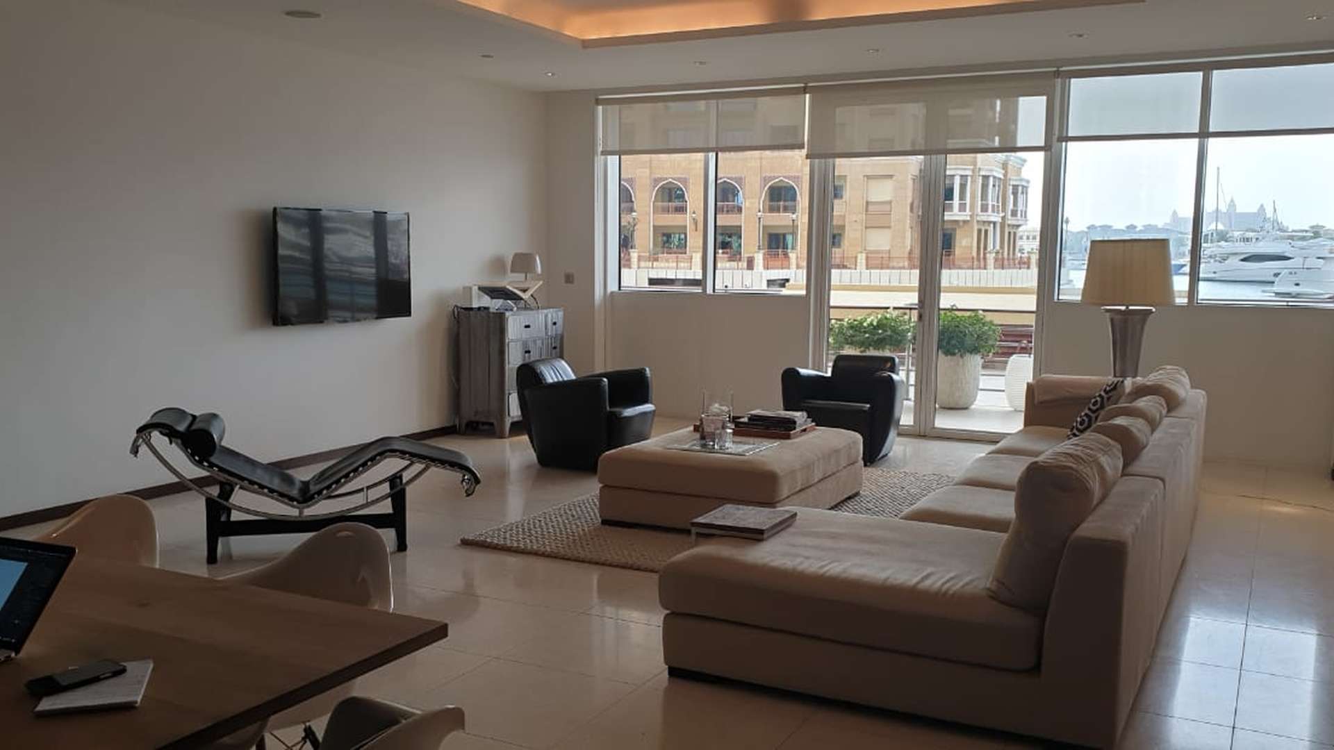 Modern kitchen in Tiara Residence apartment, Palm Jumeirah, featuring sleek cabinetry and appliances