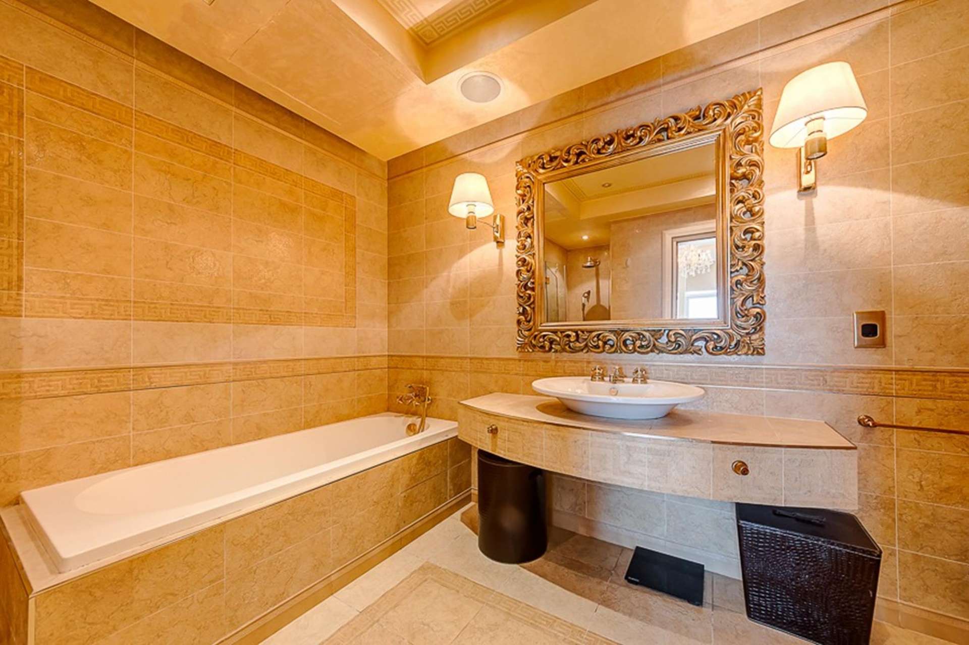 "Spacious balcony with marina and Atlantis views at Tiara Residences, Palm Jumeirah apartment.",Luxurious bathroom in Tiara Residences apartment, featuring elegant design and modern fixtures