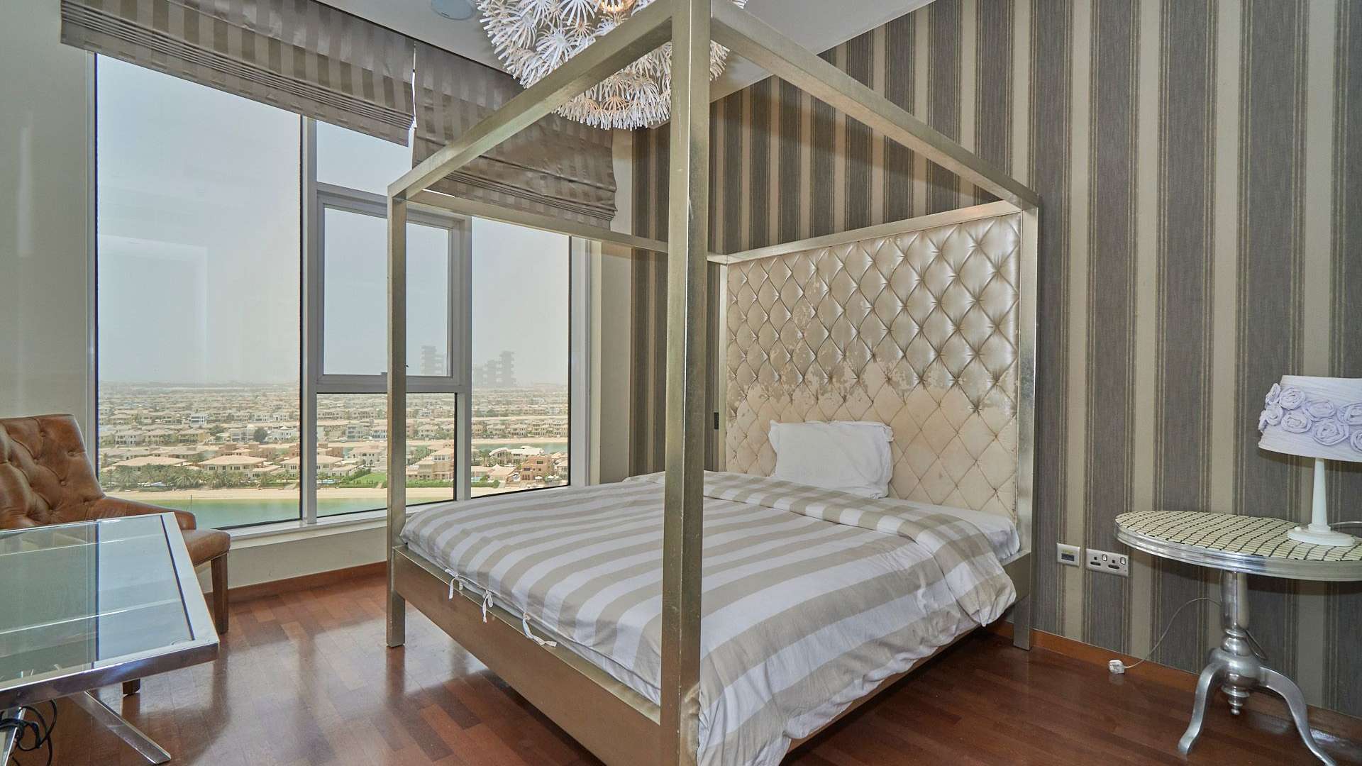 Sea-facing balcony view from Tiara Residences apartment, overlooking marina and Palm Jumeirah skyline