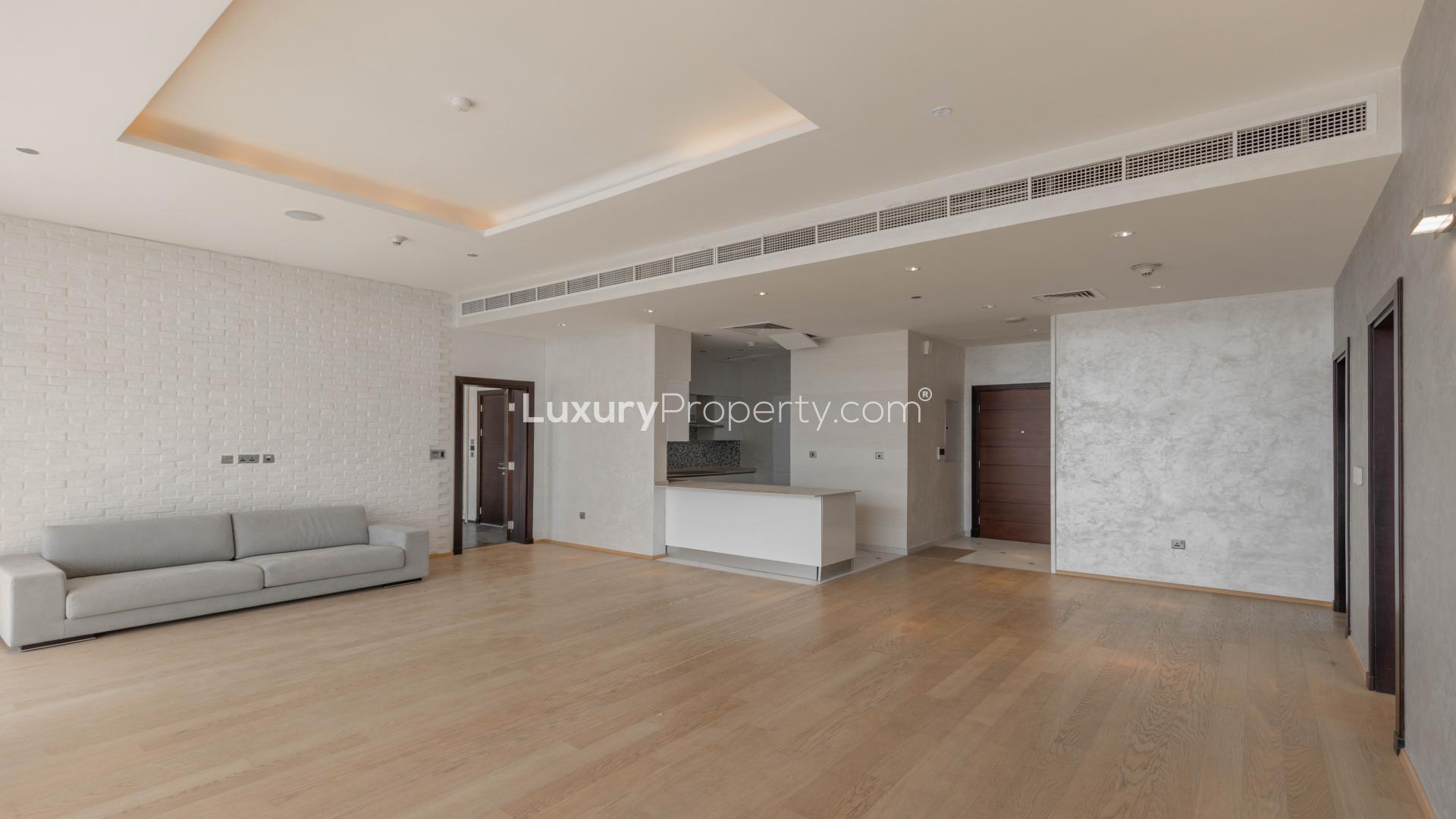 Renovated high-floor apartment living room in Tiara Residences, Palm Jumeirah, for sale