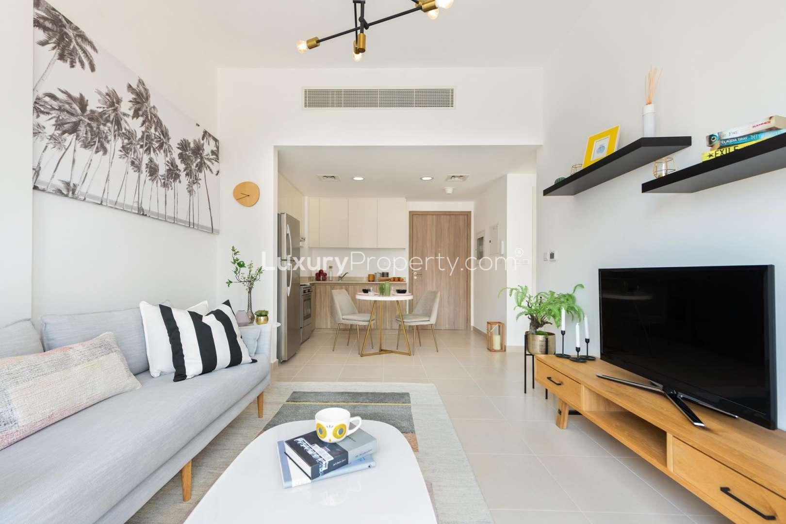 Modern living room in 1-bedroom apartment, UNA Apartments, Dubai Town Square, bright decor