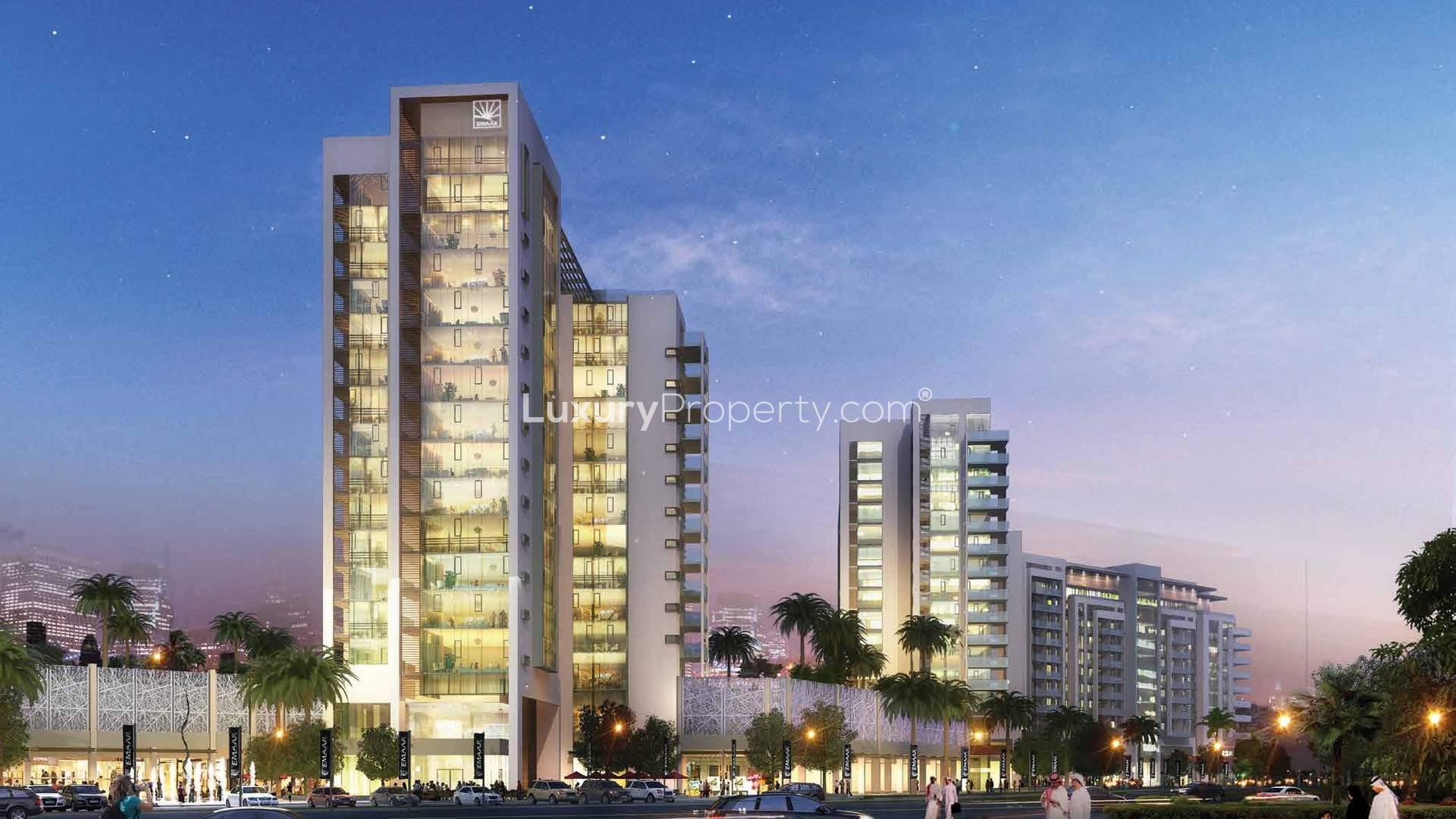 Exterior view of Vida Residence, The Hills apartment with pool and terrace at dusk