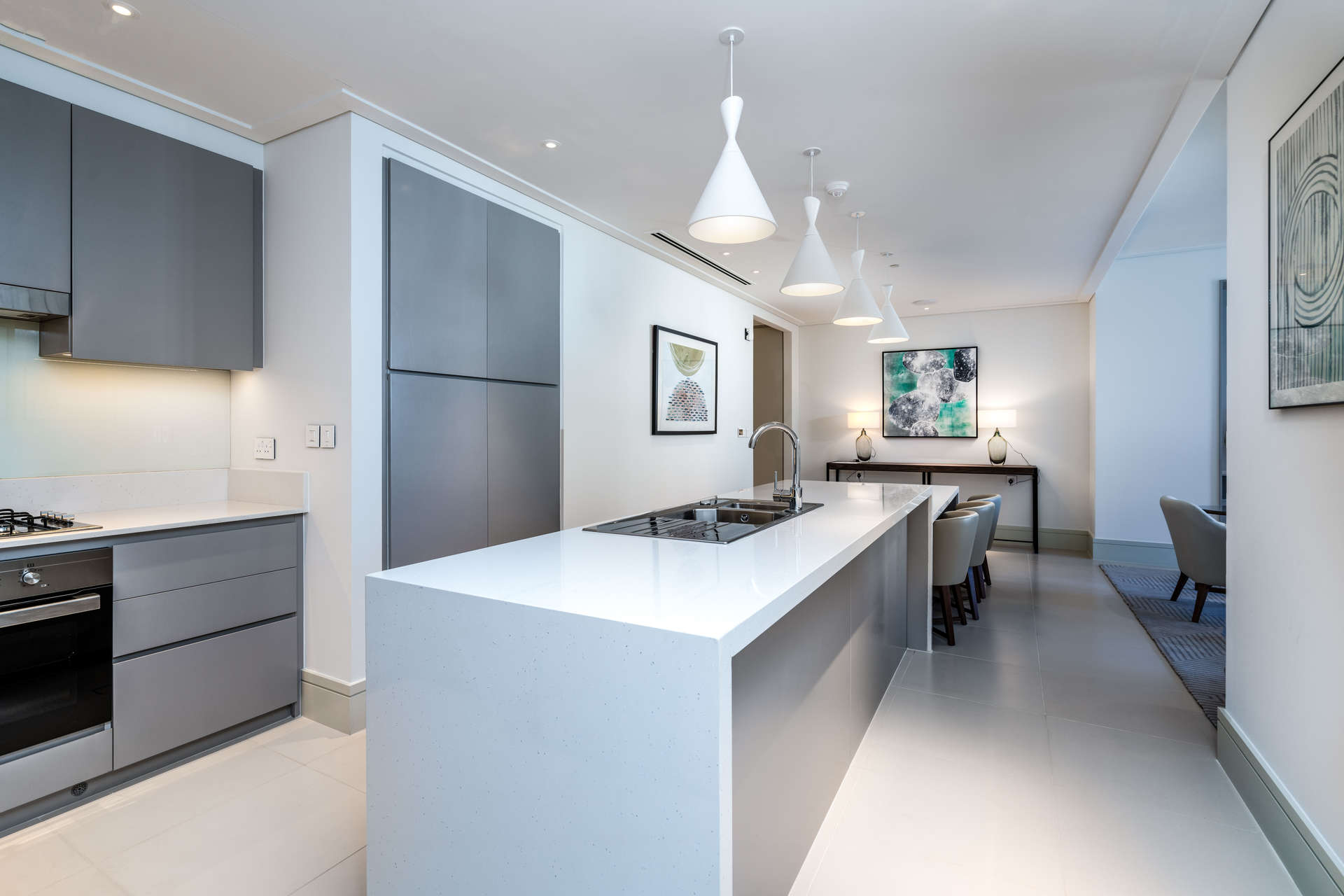 Modern living room in 2-bedroom apartment, Vida Residences Downtown Dubai, featuring stylish furnishings