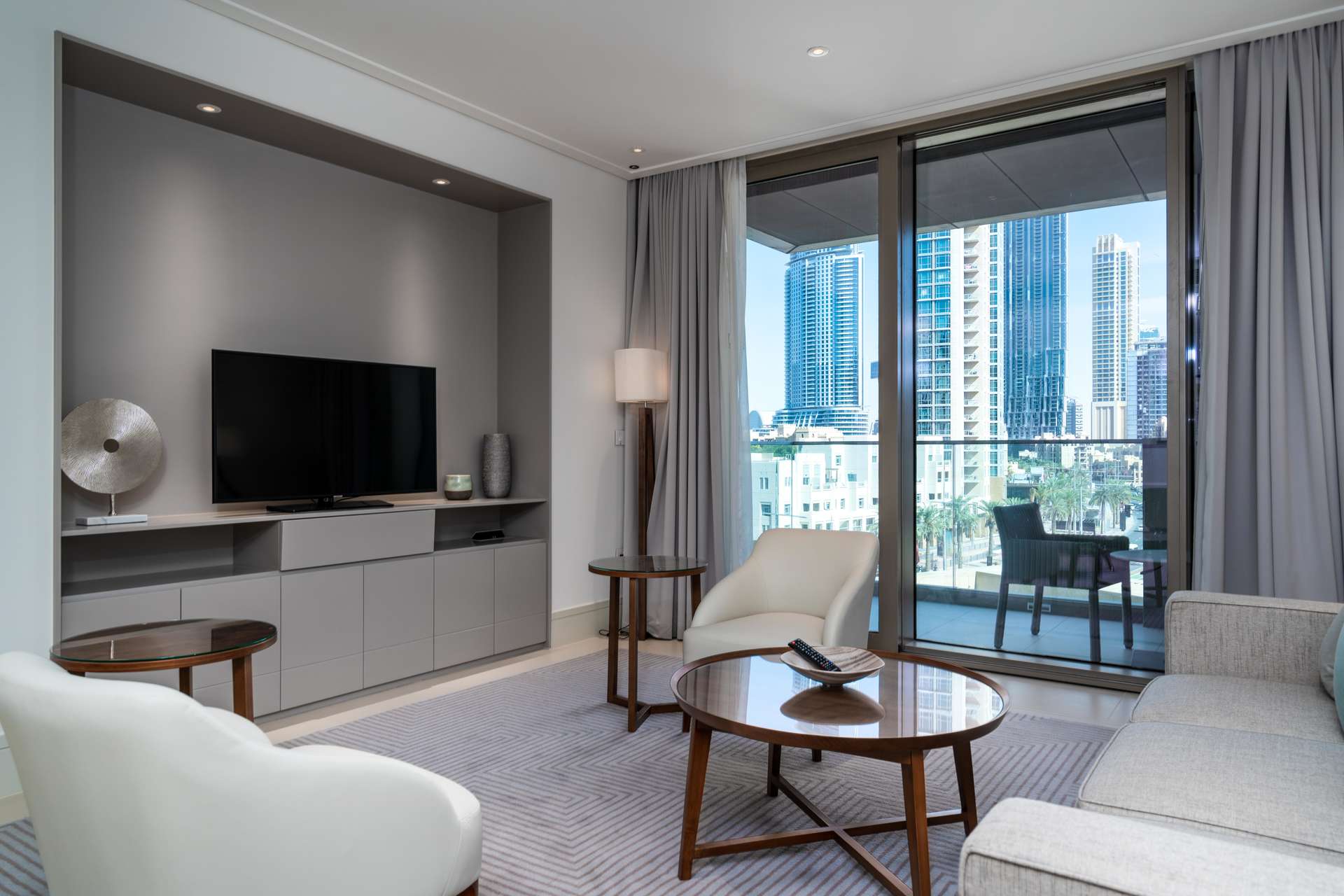 Modern living room in Vida Residence Downtown Dubai apartment with city skyline view