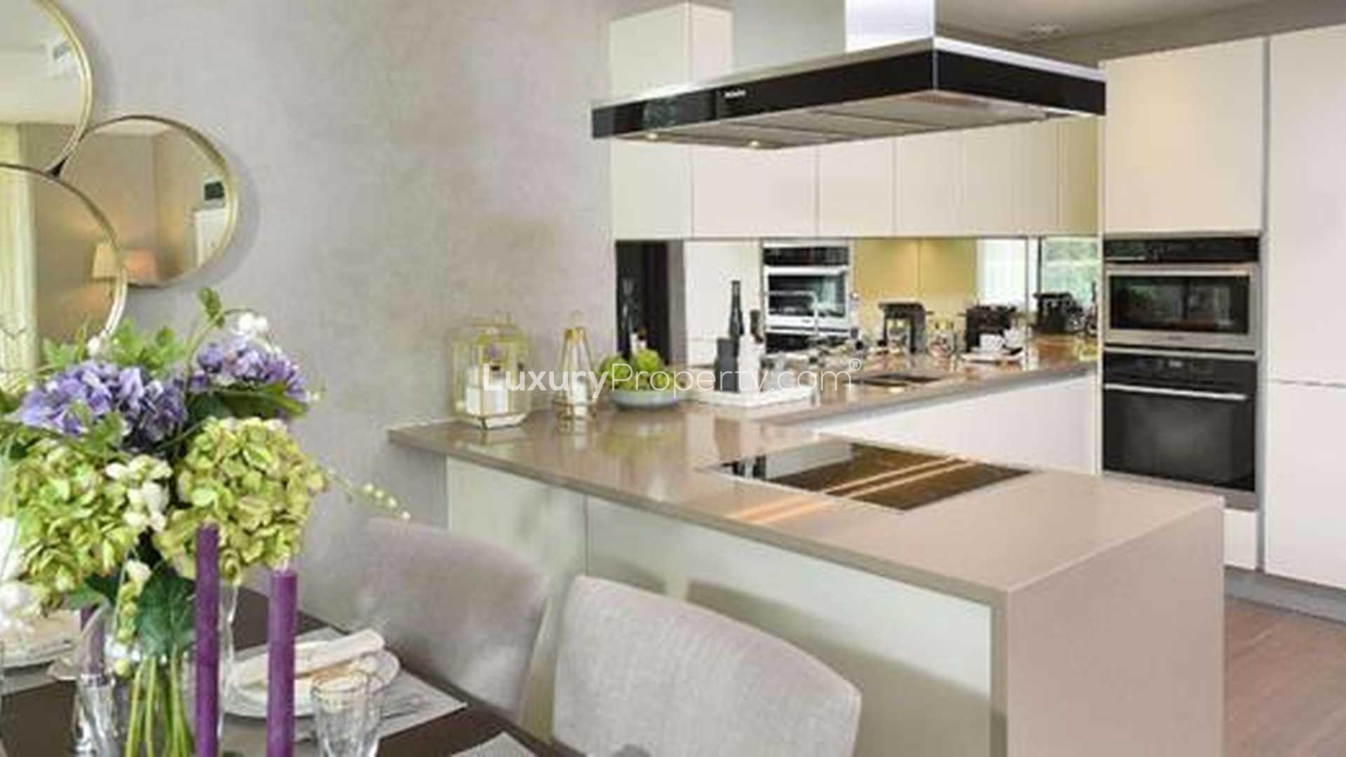 Elegant bedroom in two-bedroom apartment, Vista Chelsea Bridge, Battersea, London. Modern decor, natural light