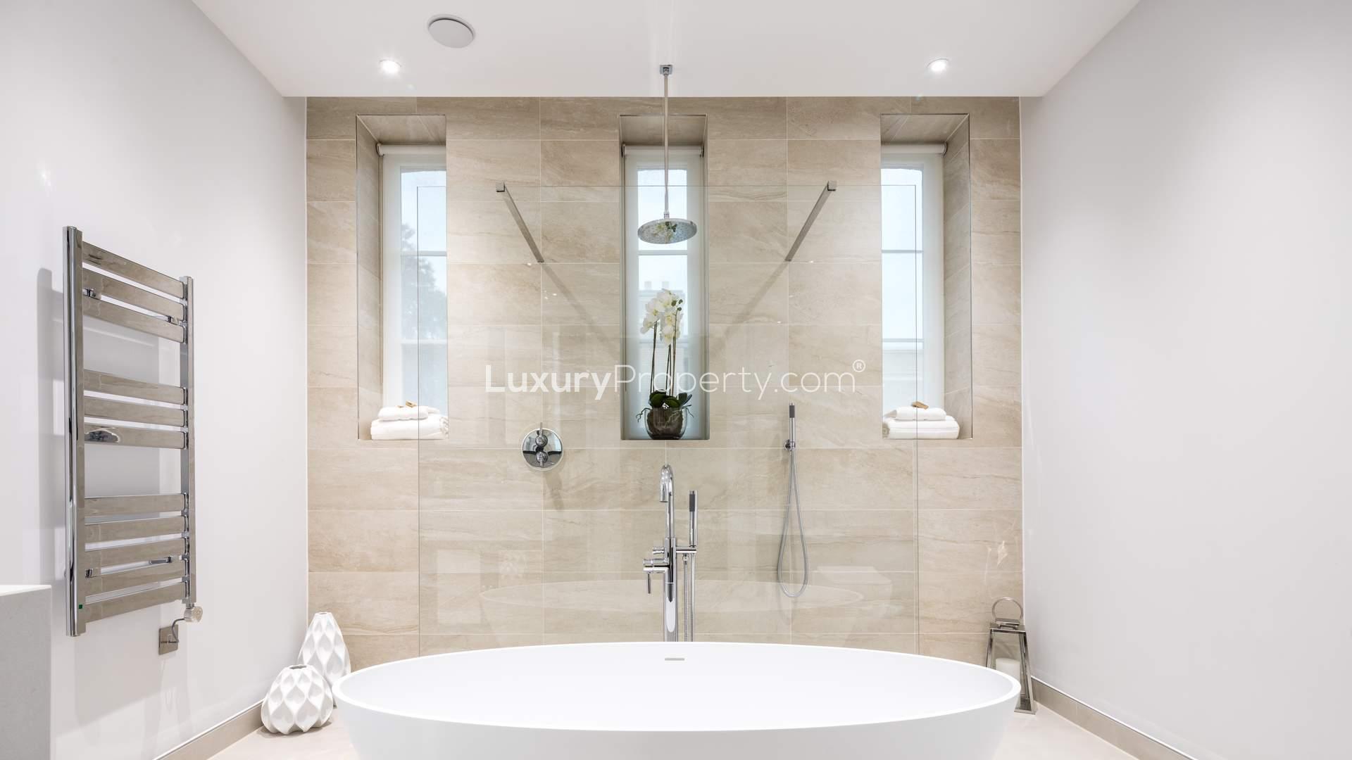 Luxurious bedroom with elegant decor in Wimbledon Hill Park duplex apartment, London