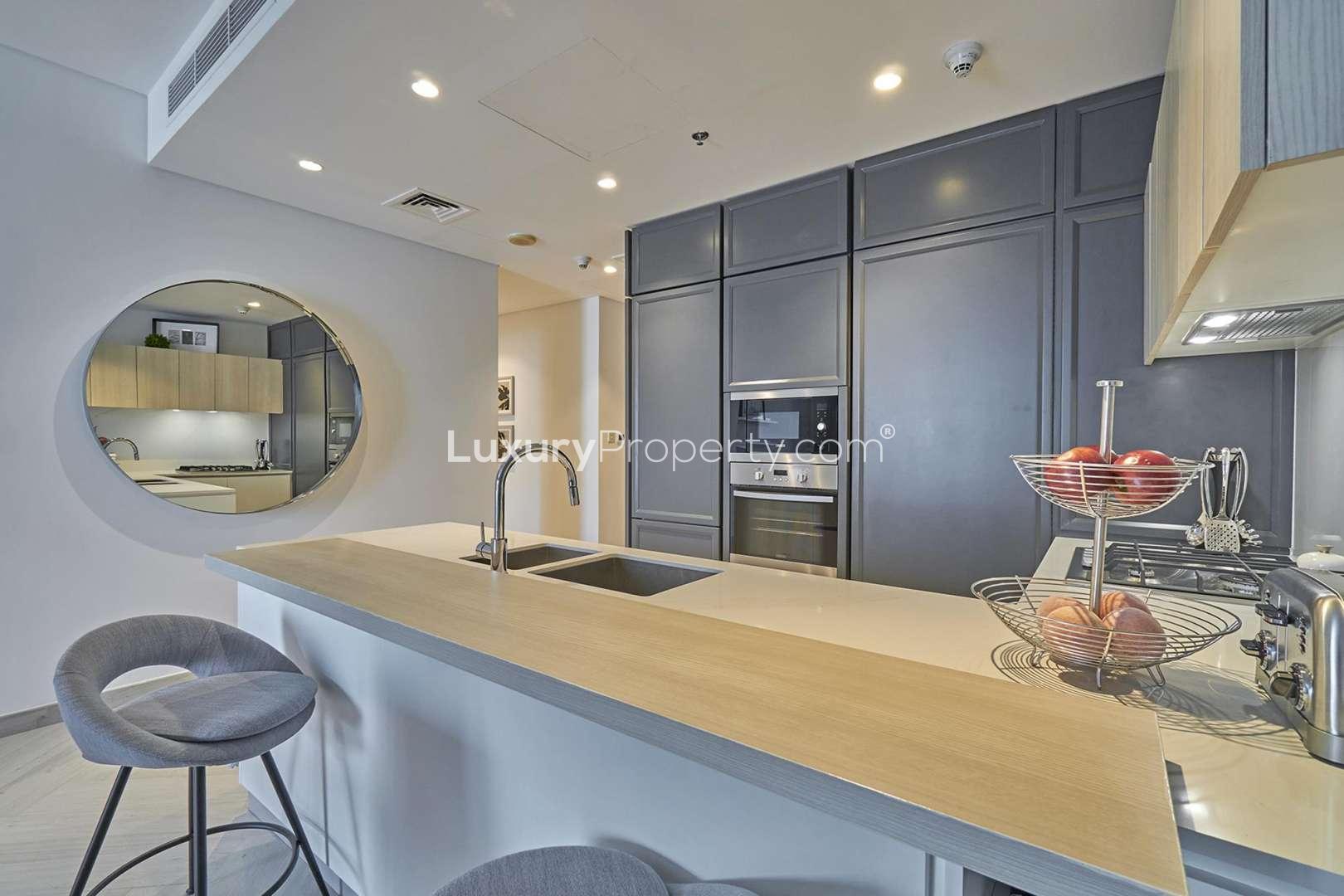 Modern kitchen in Wilton Terraces 1 apartment, Mohammed Bin Rashid City, with sleek design